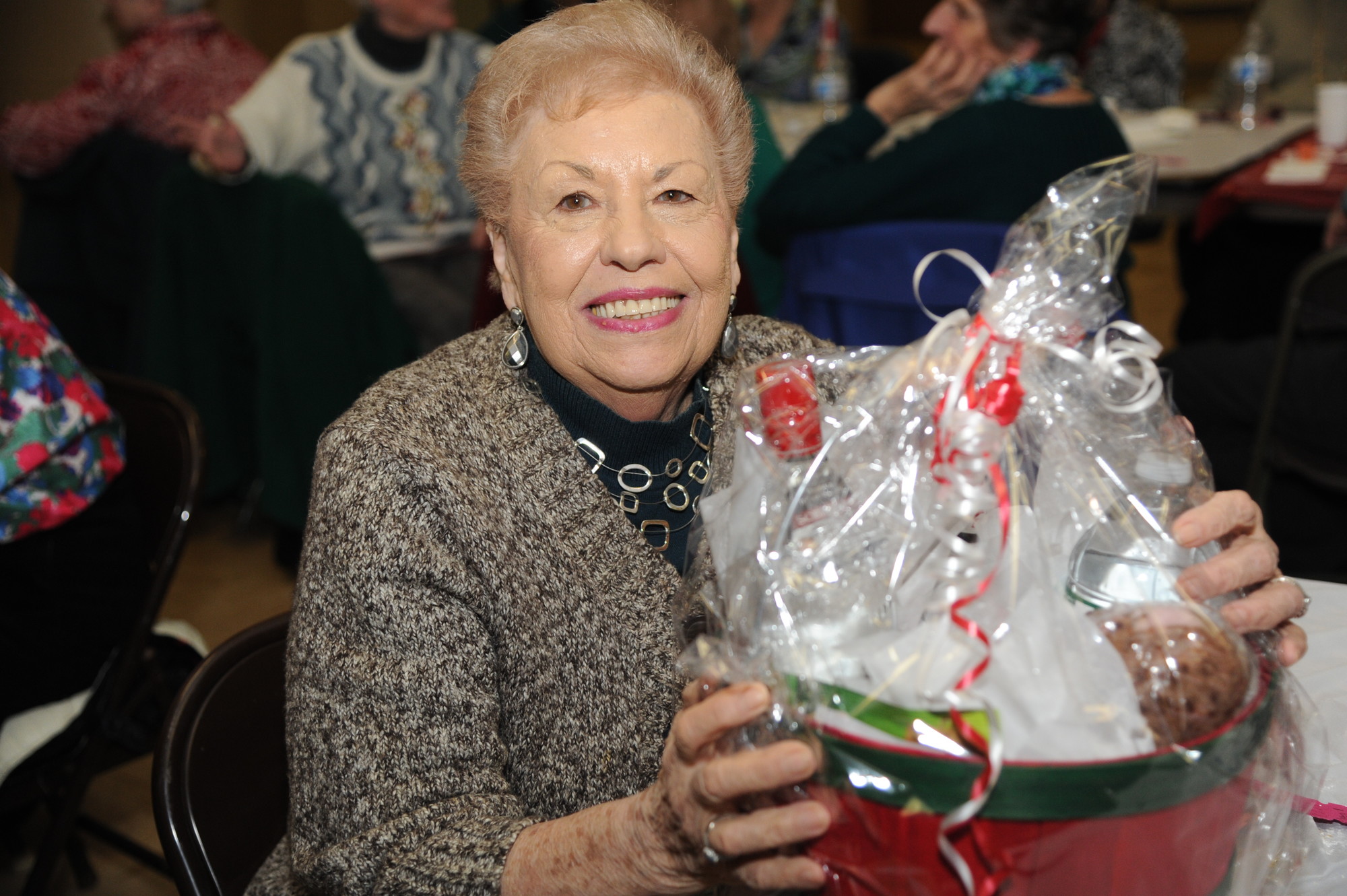 Jo Baumgartner was all smiles after winning a gift basket.