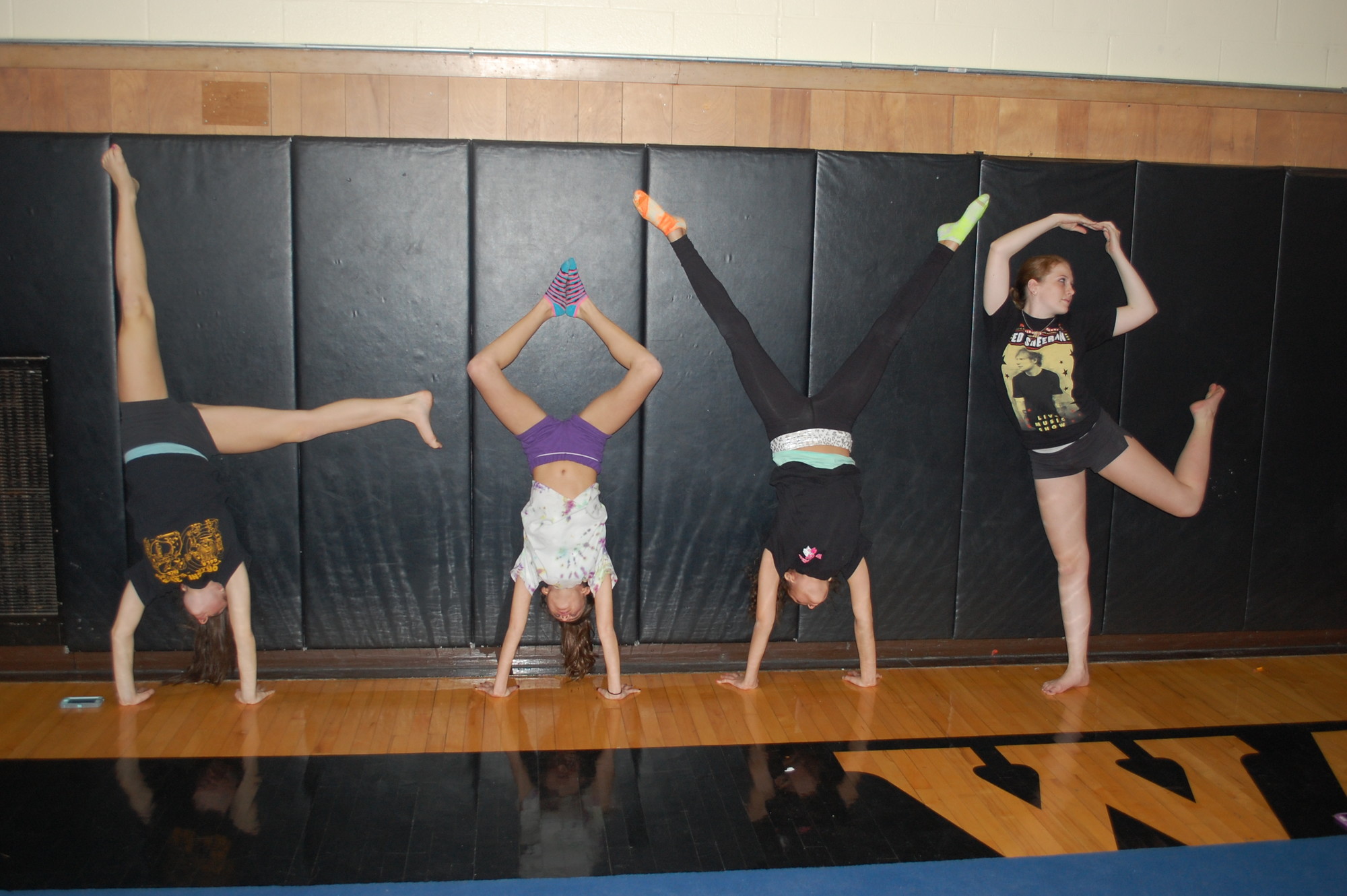 Members of the Wantagh gymnastics team spelt out "Love."