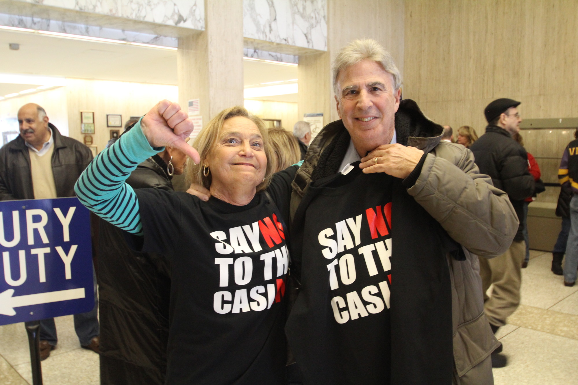 In the Nassau County Supreme Court building, Linda and Howard Siegel, residents of Meadowbrook Pointe in Westbury, gave a thumbs down.