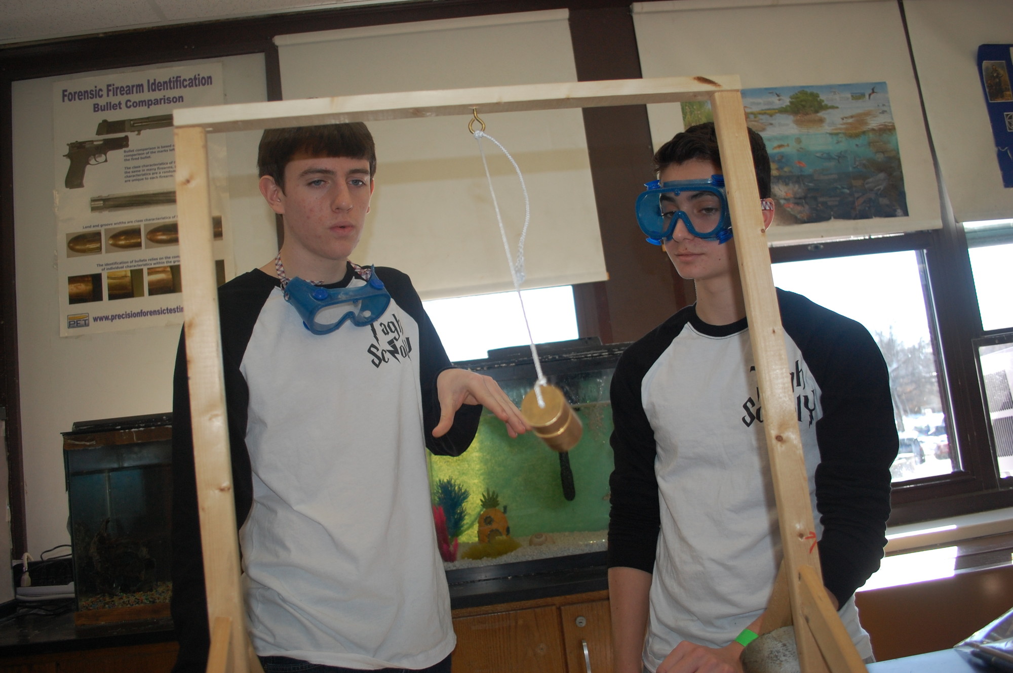 Wantagh High School Science Olympiad members Brian Tretter, left, and Greg Westhoff participated in “It’s About Time.” The event tested their knowledge of time and their skill in building a timekeeping device.