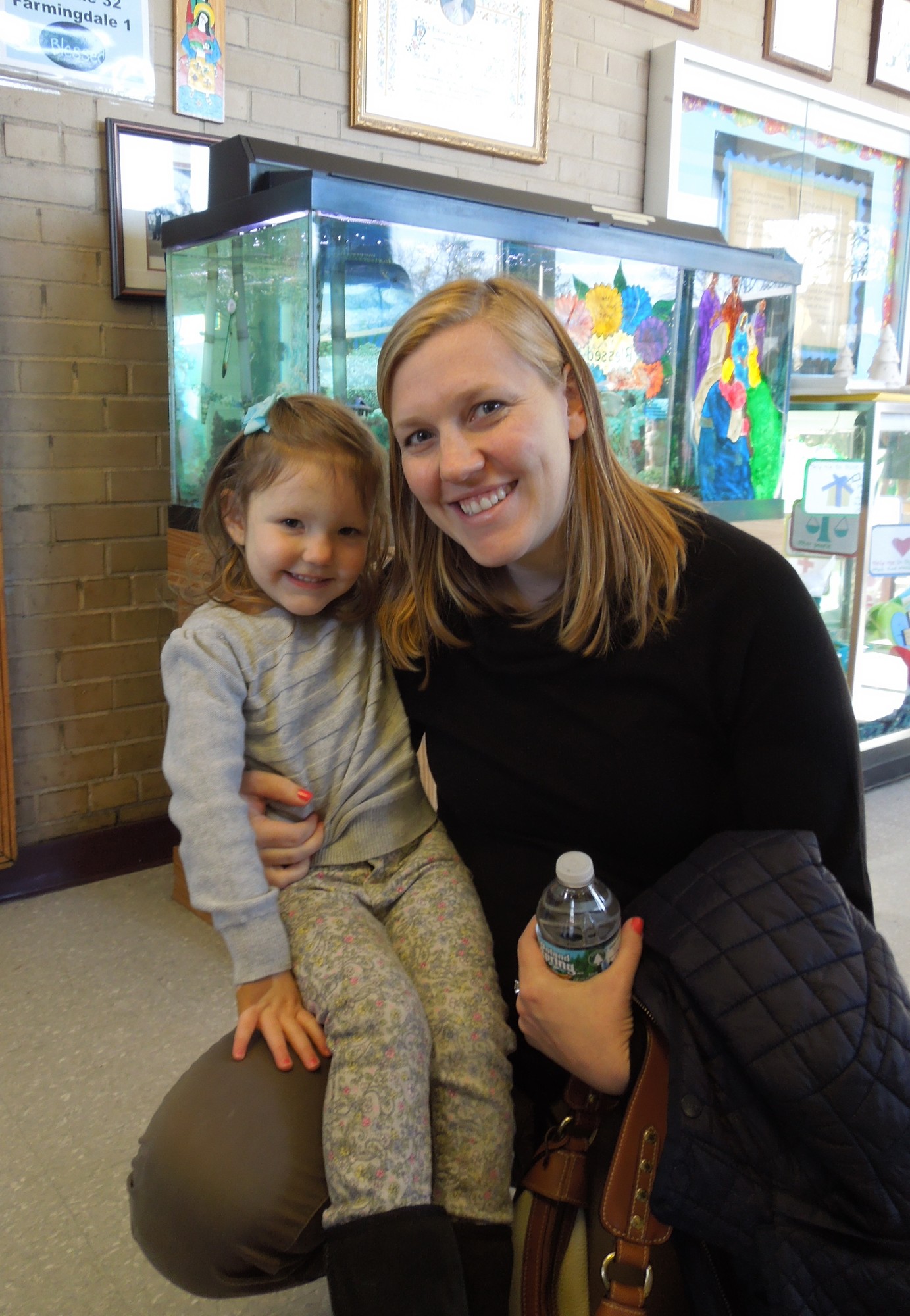 Laura Caddick-Wade and her daughter, Avery, toured the school.