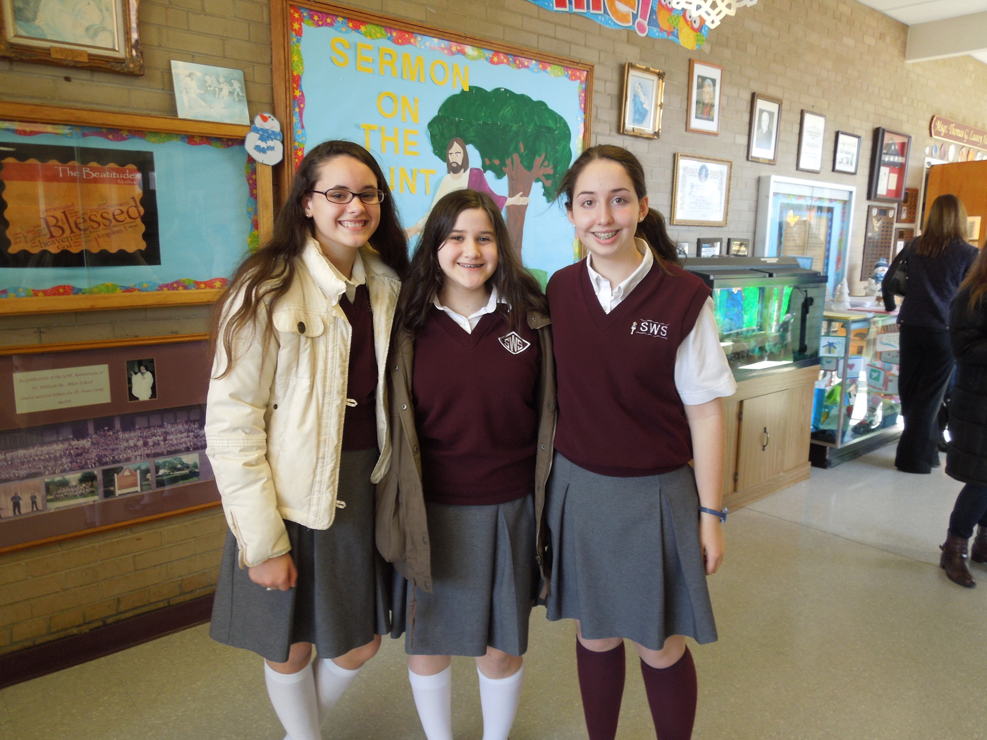 St. William the Abbot School eighth-graders, from left, Olivia Lattieri, Ava Azueta and Meghan Monahan were tour guides at the open house on Jan. 25 marking the beginning of Catholic Schools Week.