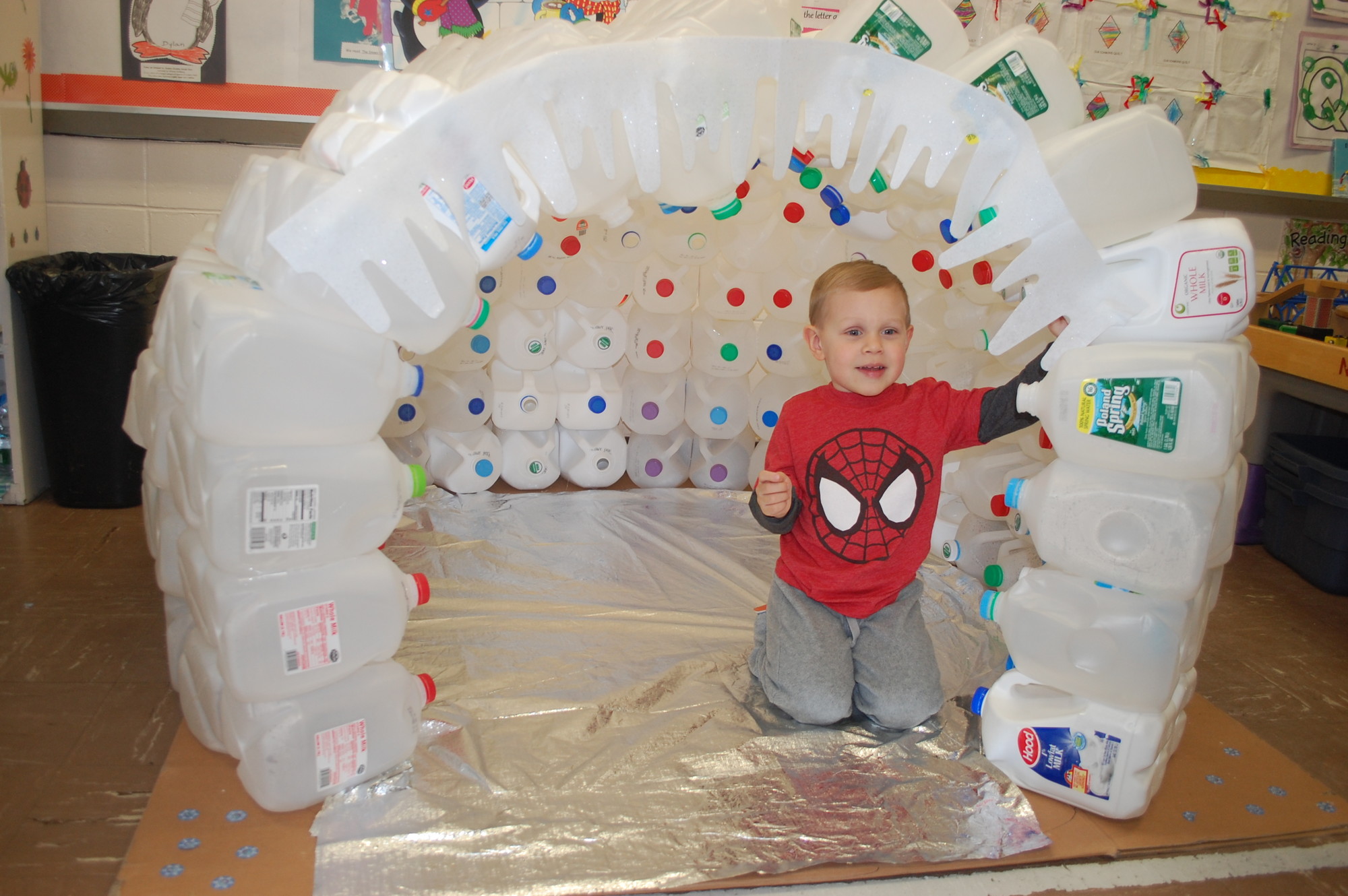 Brian Pietrangelo, 3, who likely will attend nursery school at Maria Regina next year, explored an igloo made from plastic bottles.