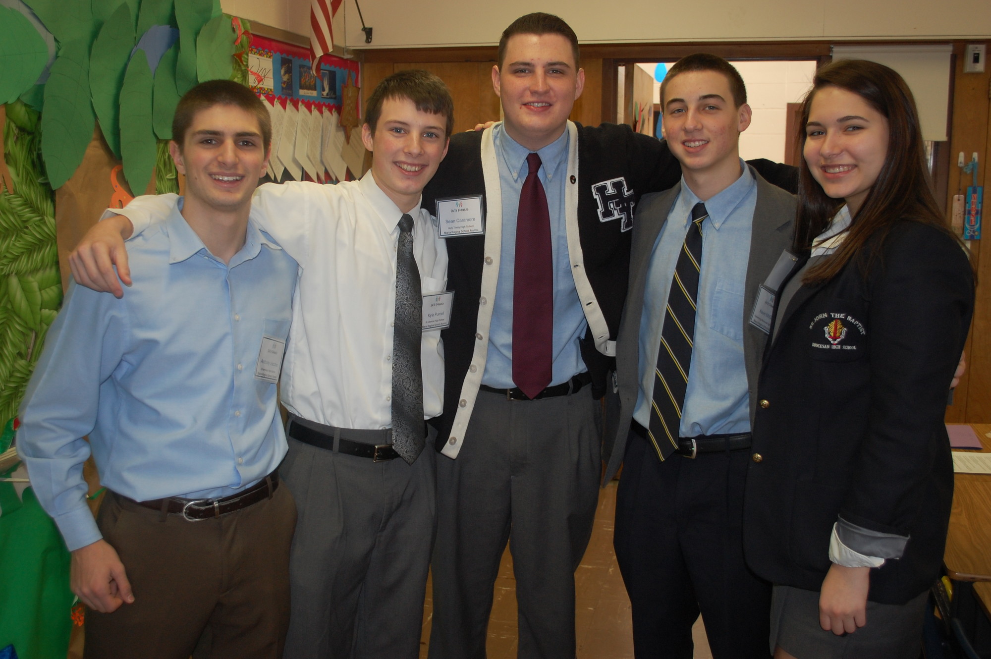 Maria Regina alumni, from left, Anthony Vecchio, Kyle Purcell, Sean Caramore, Kevin McGee and Julia Rooney came back to give tours at the Jan. 25 open house.