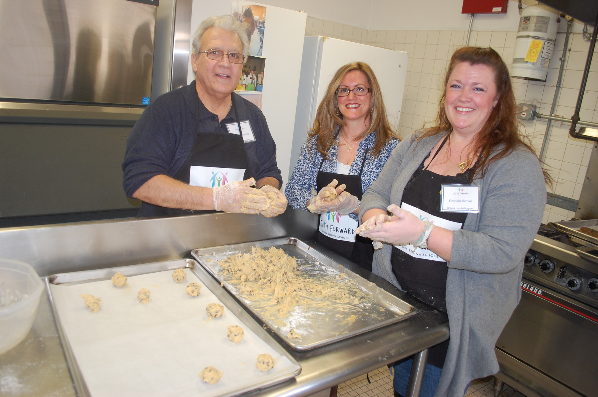 Vincent Mondello, Pattie Migliore and Patricia Brown baked fresh cookies for guests.