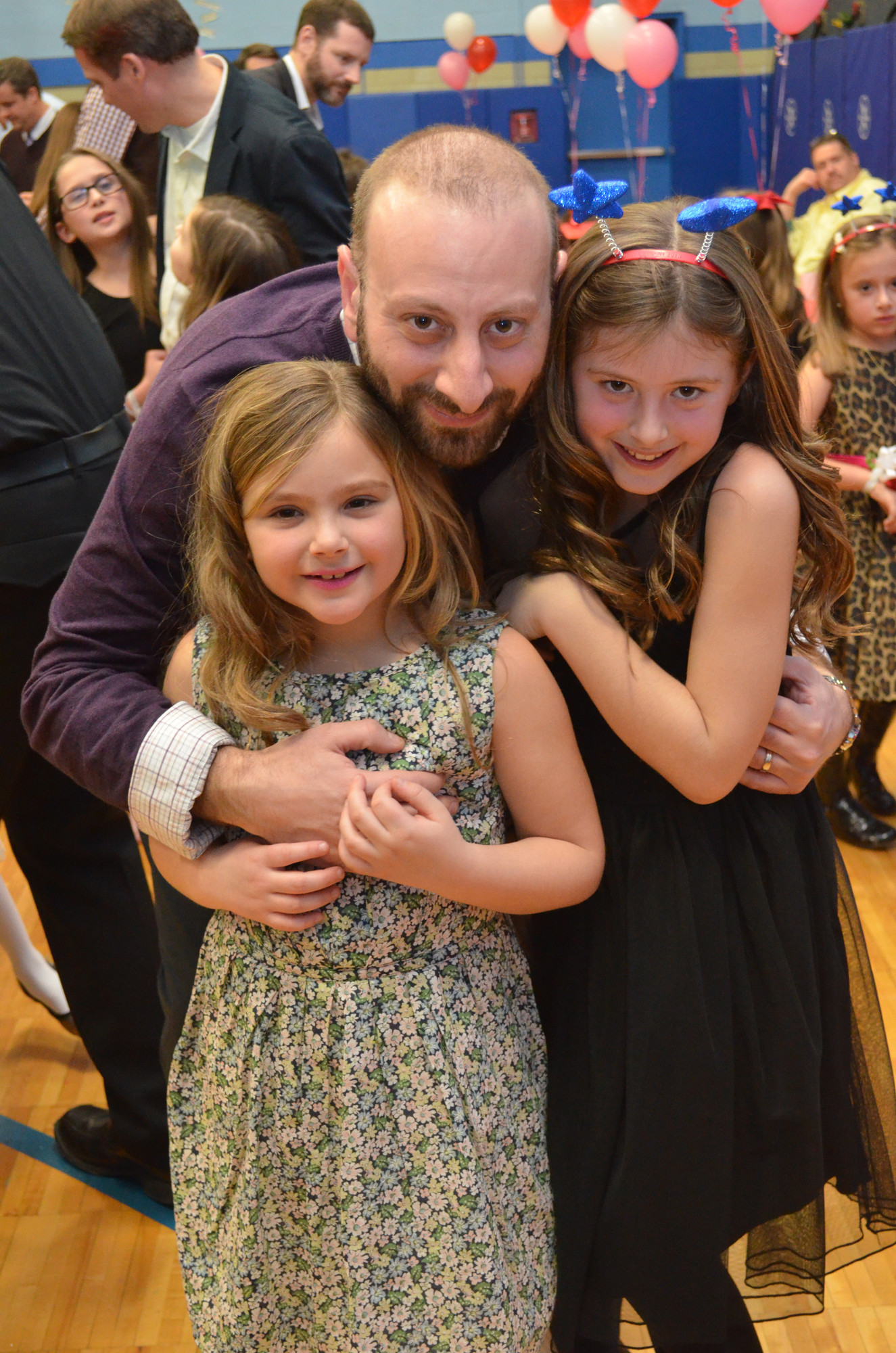 Michael Cesarini with his daughters Sophia, left, 7 and Sienna, 9.