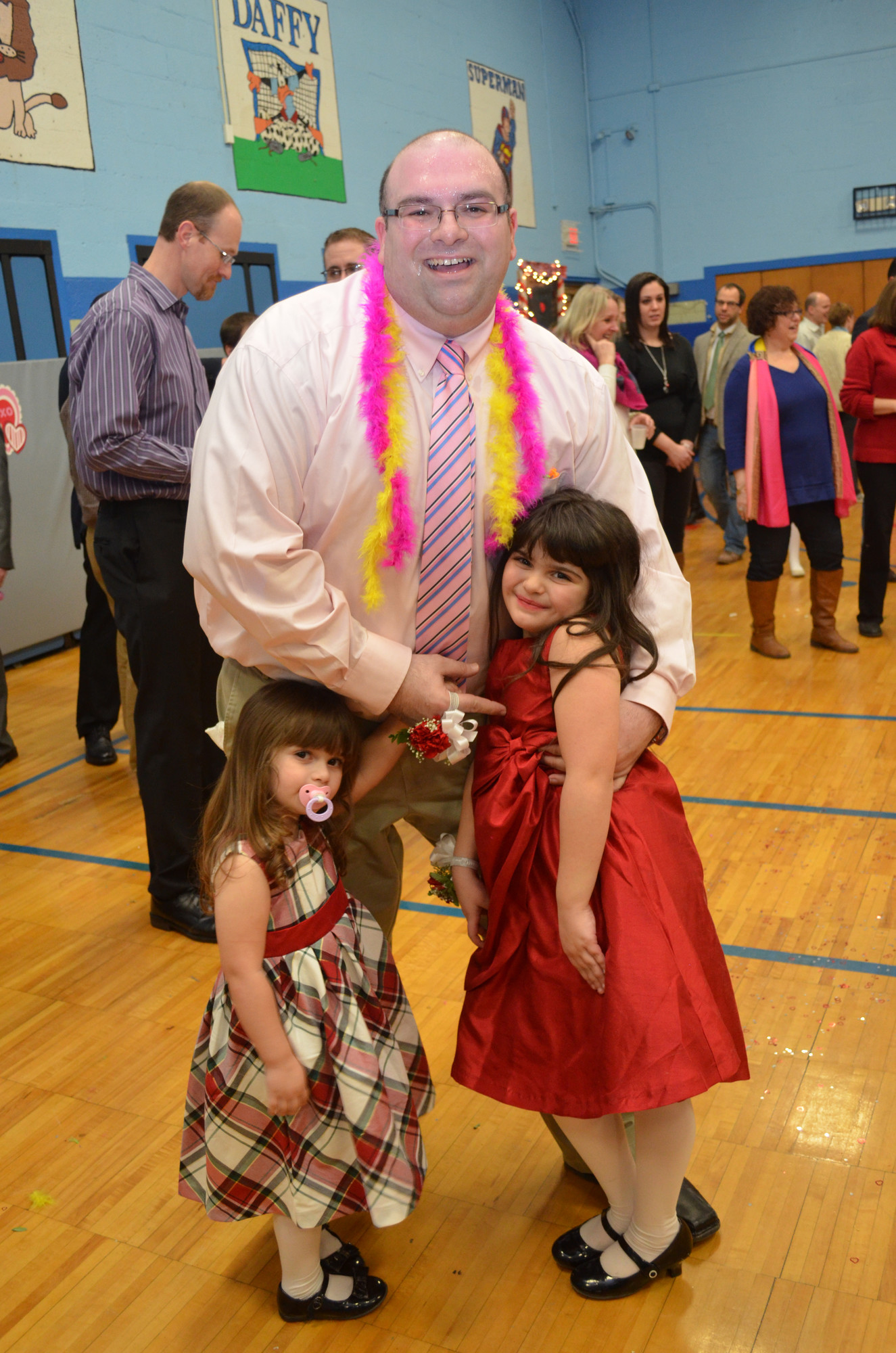Rich Petrone danced with his daughters Lily, right, who is in first grade, and Emma.