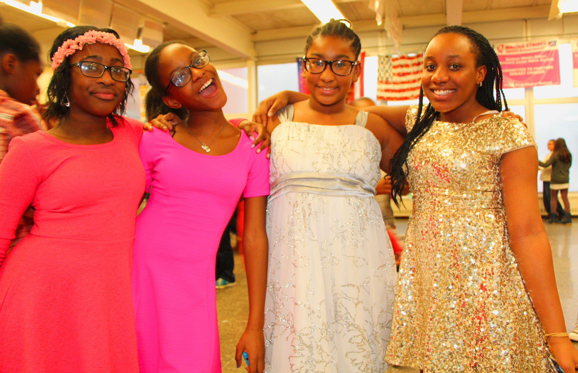 Girls and boys dressed up for the dance, including, from left, Terae Richardson, 11, Felicia Warrington, 11, Mahlasia Simmons, 11, and Aishat Shittu, 11.