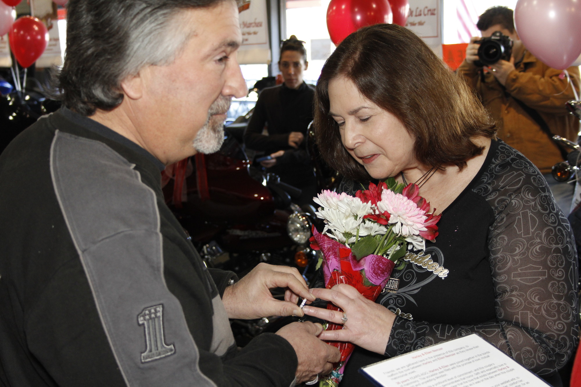 Ellen Nemzer, of Wantagh, placed her husband, Harley’s, wedding ring on his finger during the ceremony.