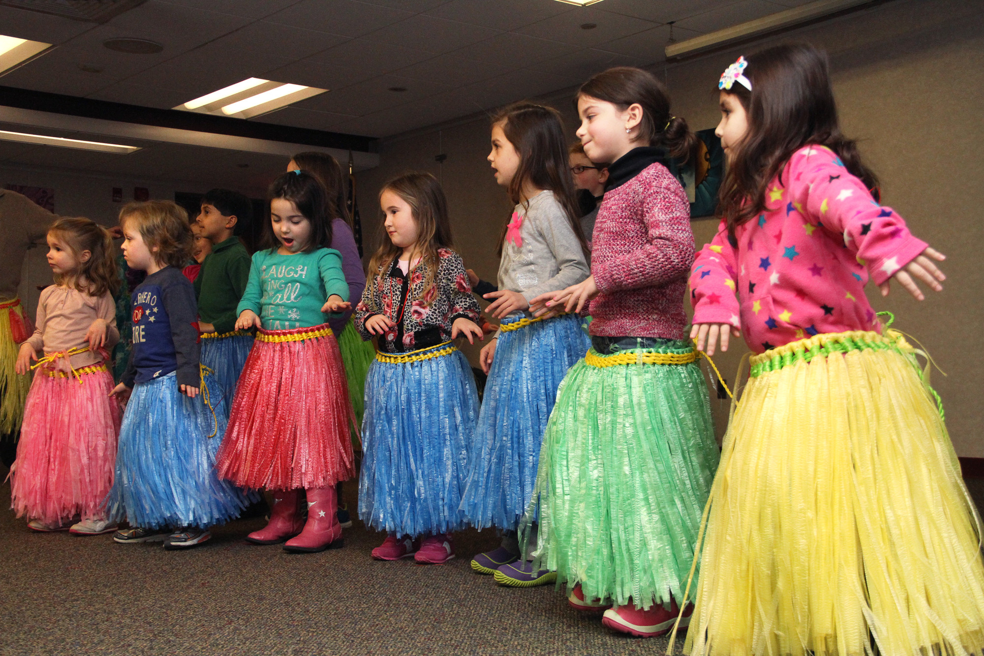 Much of the audience at the show got the chance to put on their own grass skirts and dance the hula.