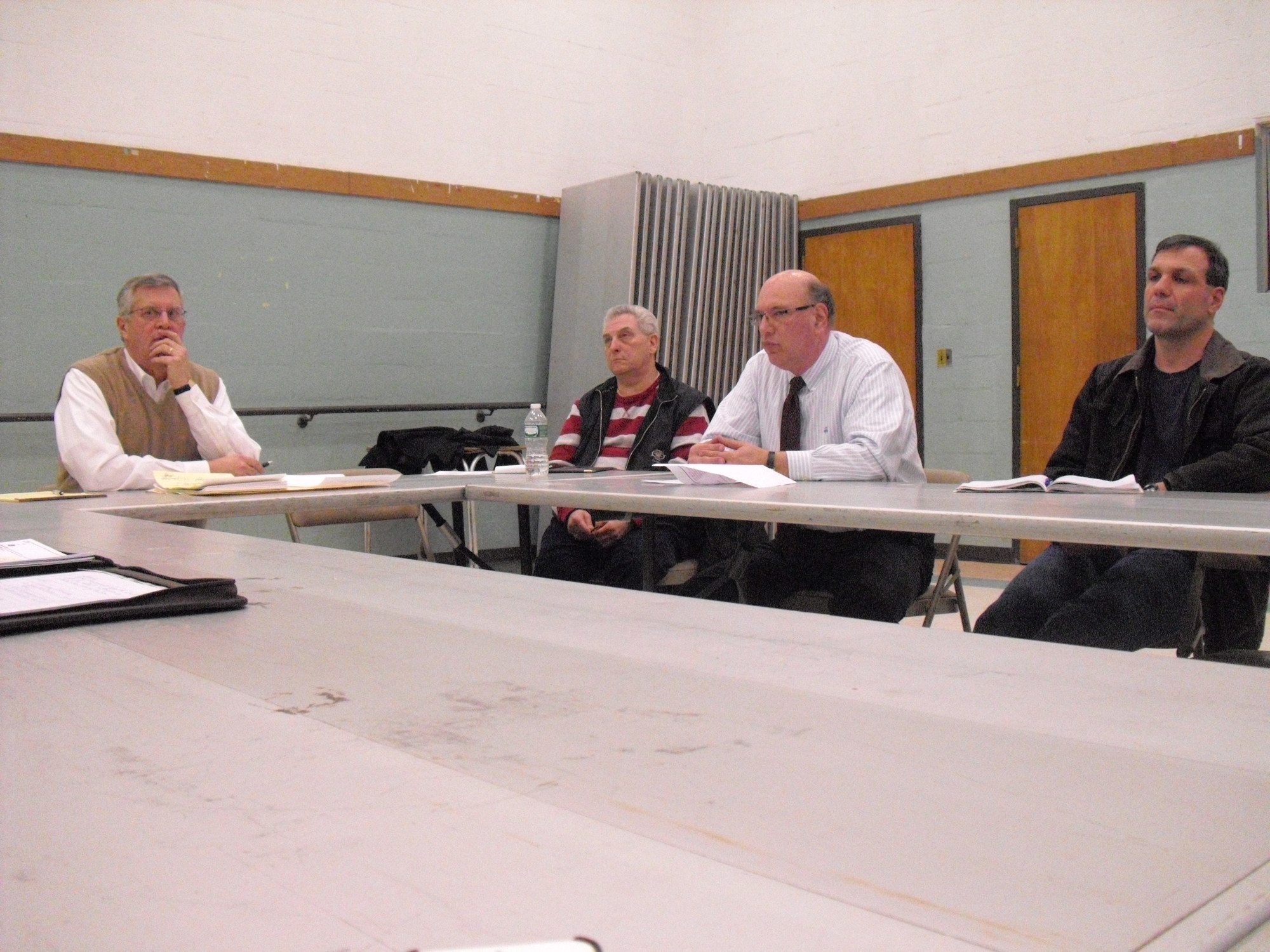 Jack Matthews, left, Tom Gallucci, Eric Sussma and Mike Travers at the first Pool Committee meeting on Feb. 26 at the Recreation Center.