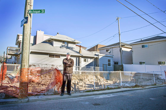 Bob Kaible, pictured in November in front of an empty lot at 24 Michigan St., where a rental property his wife and father-in-law owned once stood. On Nov. 7, a federal judge ruled that an executive at their insurance company secretly rewrote a report that originally concluded that damage to the home had been caused by Hurricane Sandy, in order to avoid a larger payout.