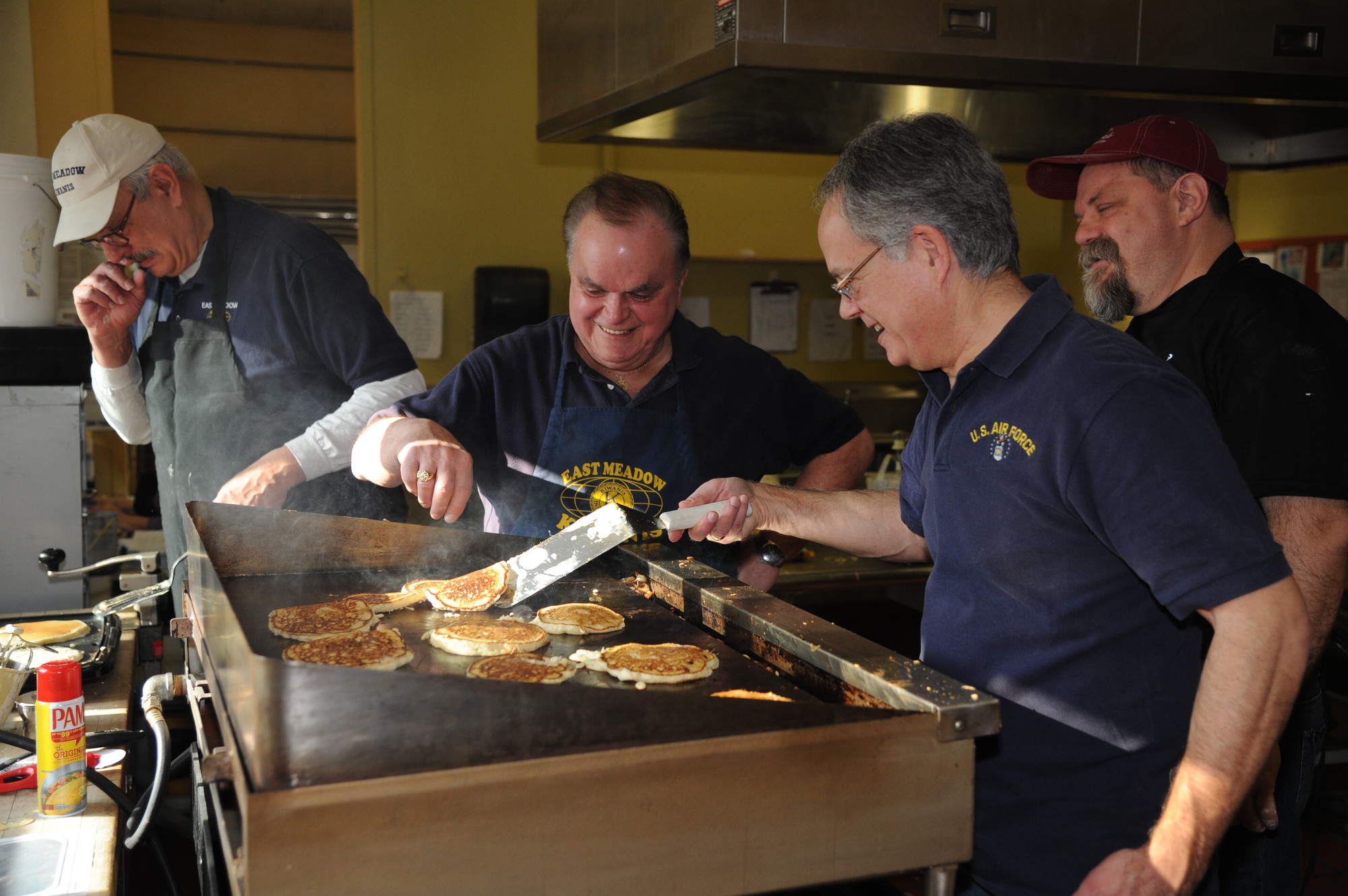 Chefs Jim Surless, 
Henry Zaradich and Mark Resnick cooked hundreds of pancakes throughout the morning.
