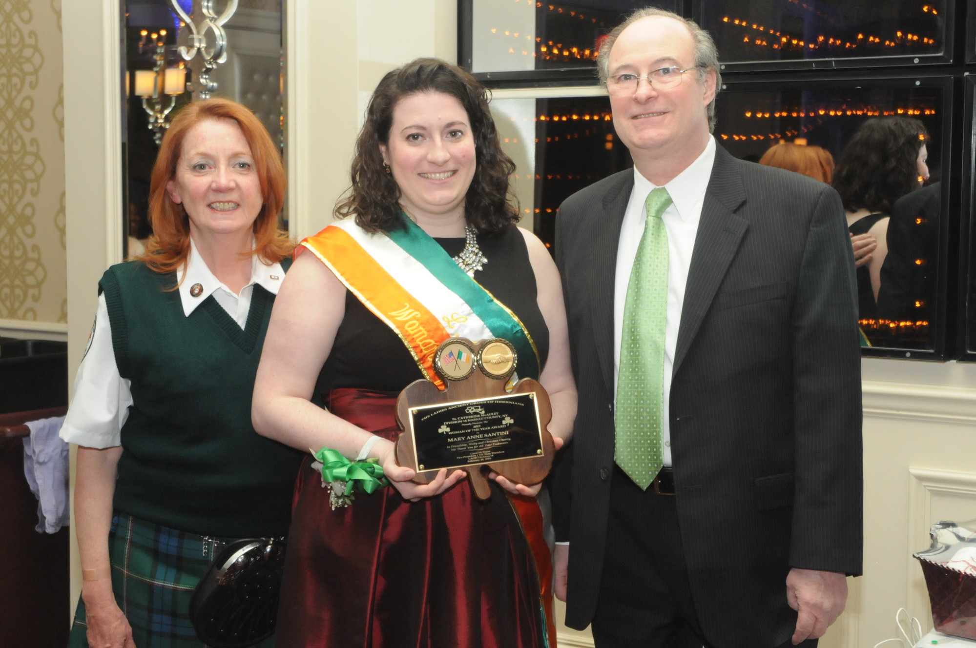 Mary Anne Santini, Lady of the Year with her parents, Albert and Mary Santini.