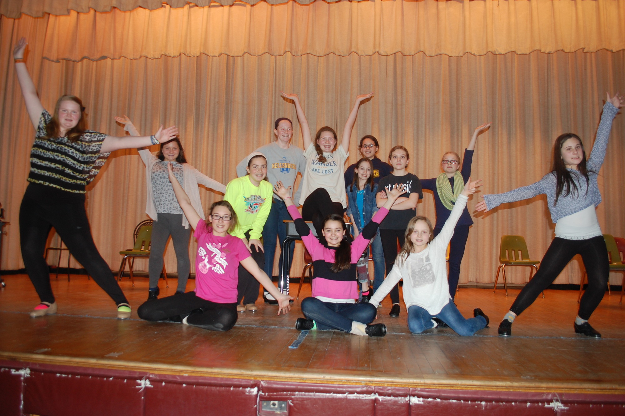 The cast of “Thoroughly Modern Millie” rehearses a musical number for the upcoming production at St. William the Abbot School.