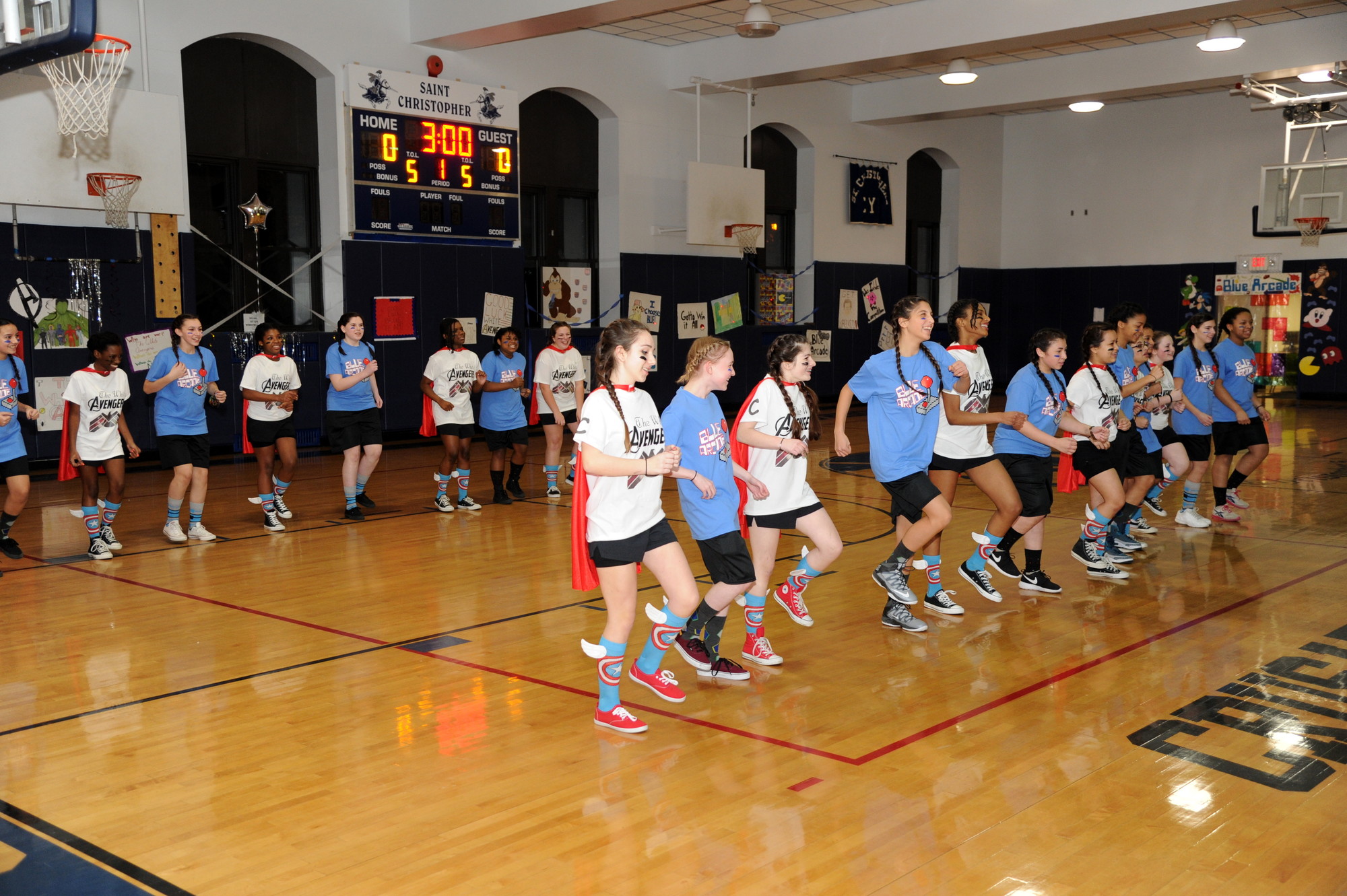 Girls on the Blue Arcade and The White Avengers teams at St. Christopher School’s Sportsnite joined together for a celebratory dance last Friday.
