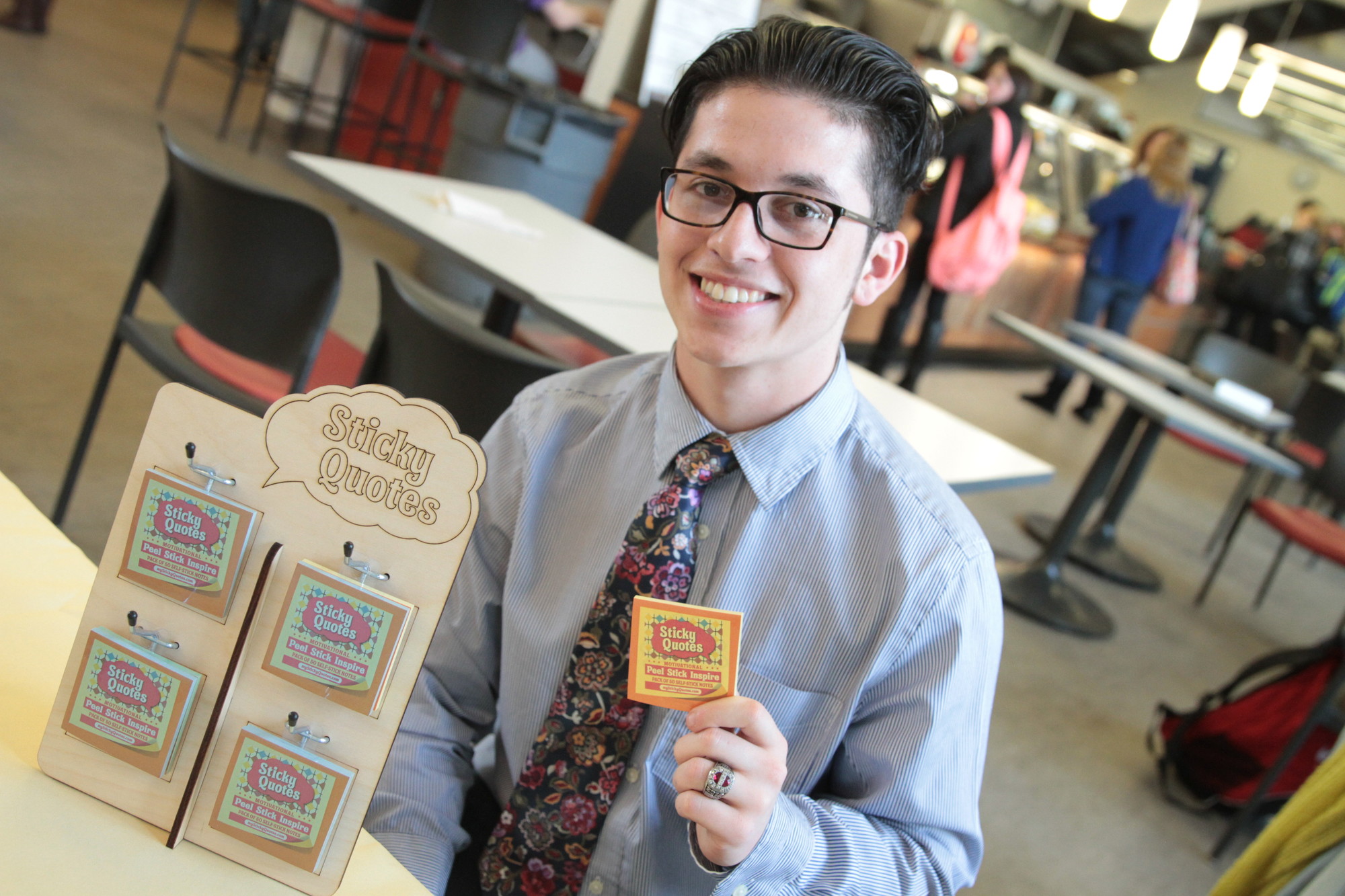 Molloy student Michael Russo sells sticky notes with inspirational sayings.