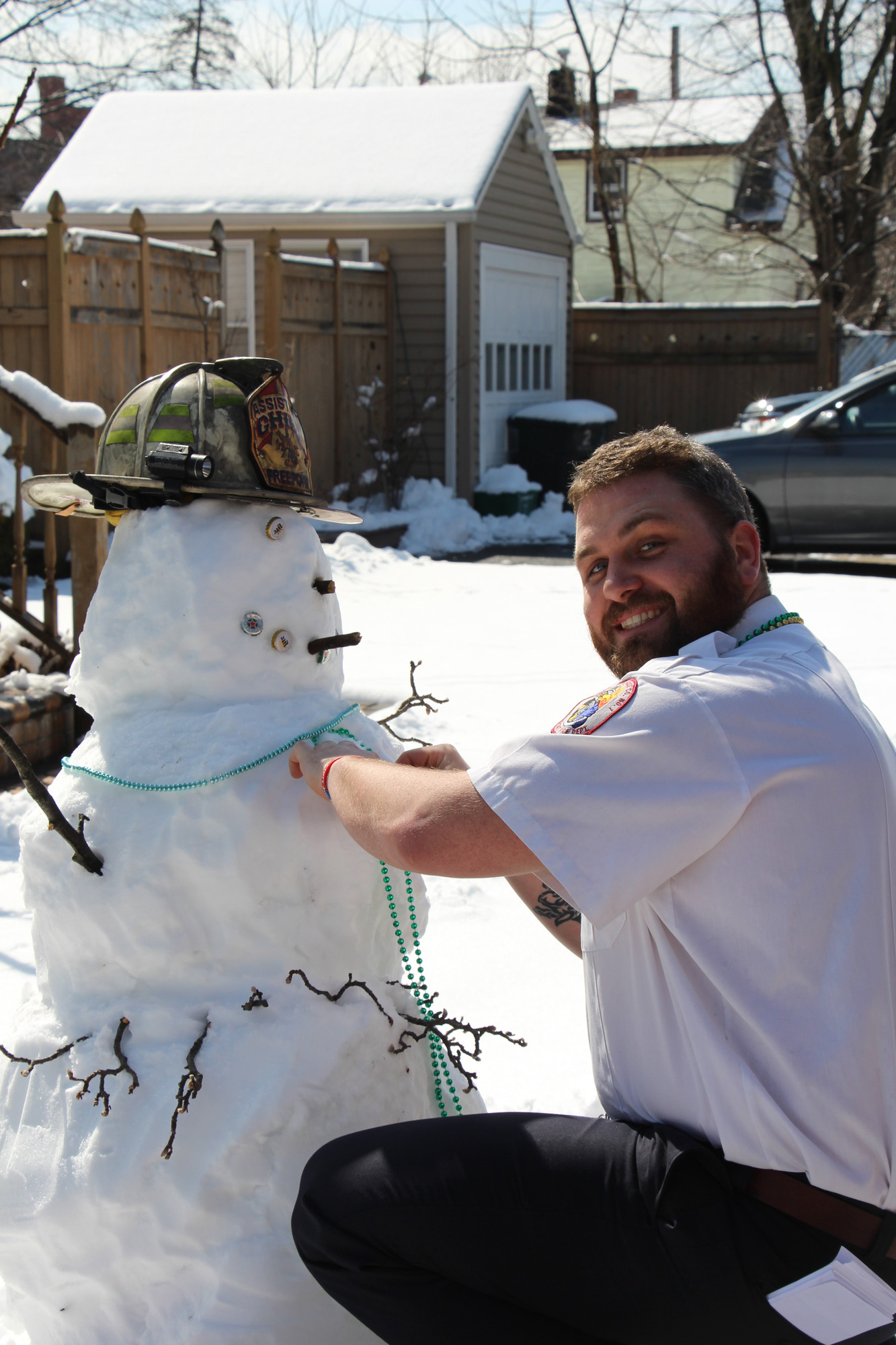 Freeport Firefighter Eddie Tyler made the best of the cold weather and gave a snowman a St. Patrick’s Parade makeover.