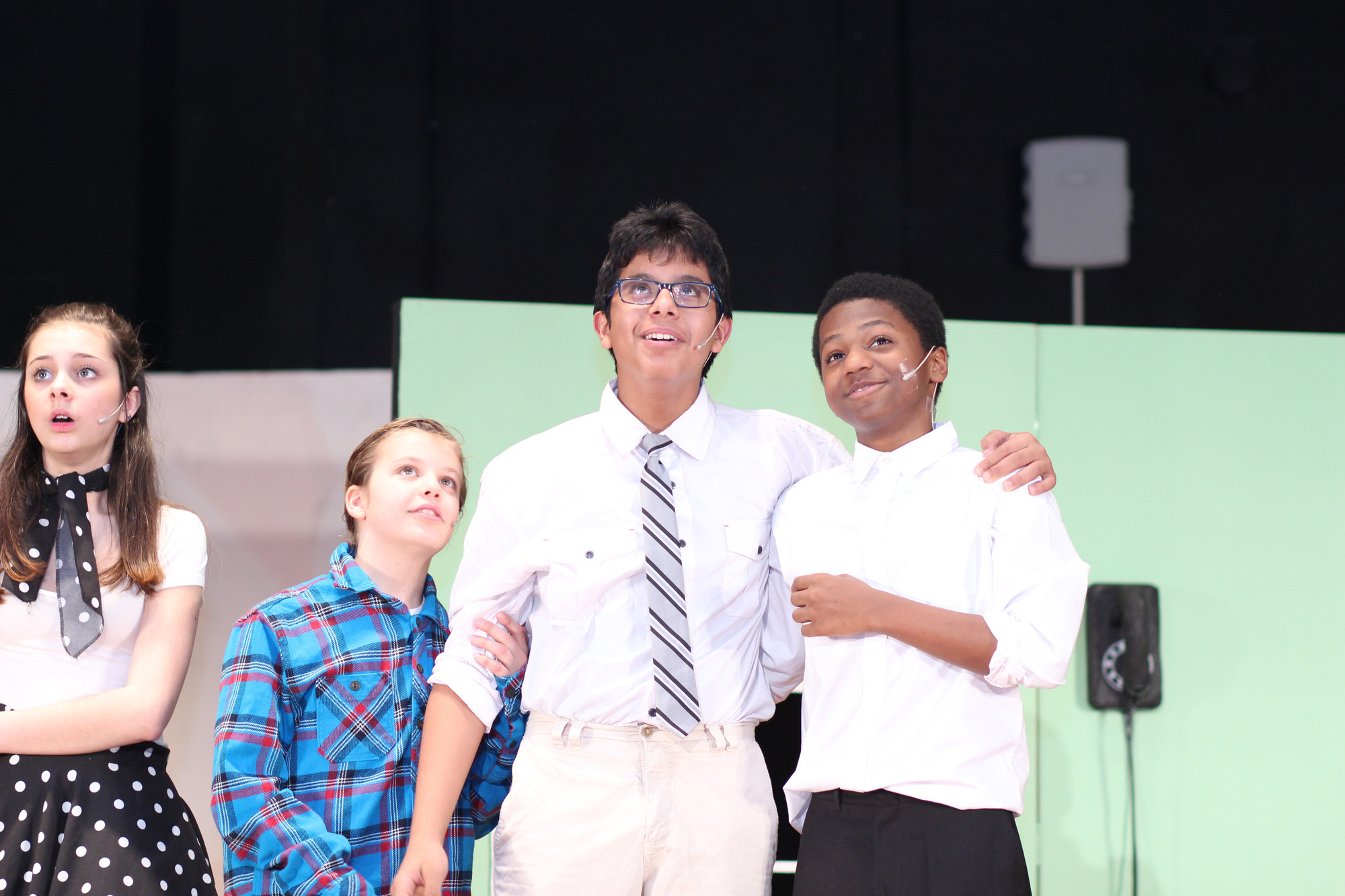 The MacAfee Family dreamed of being on the Ed Sullivan Show.  The students who played them, from left, were Perez, eighth grade, Gabriel Vukelic, sixth grade,  Ali Alsaif, eighth grade, and Joshua Davis, eighth grade.