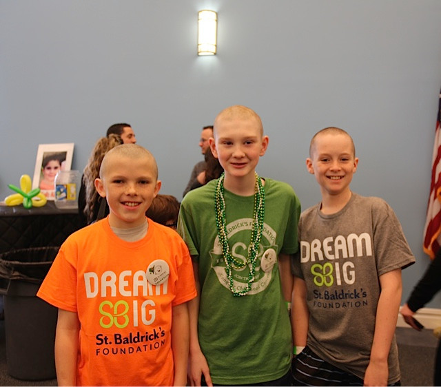 All multiple-time shavees and buddies, SSMS students Jacques Charvet, left, Brady Bender and JT Travers raised more than $4,000 this year.