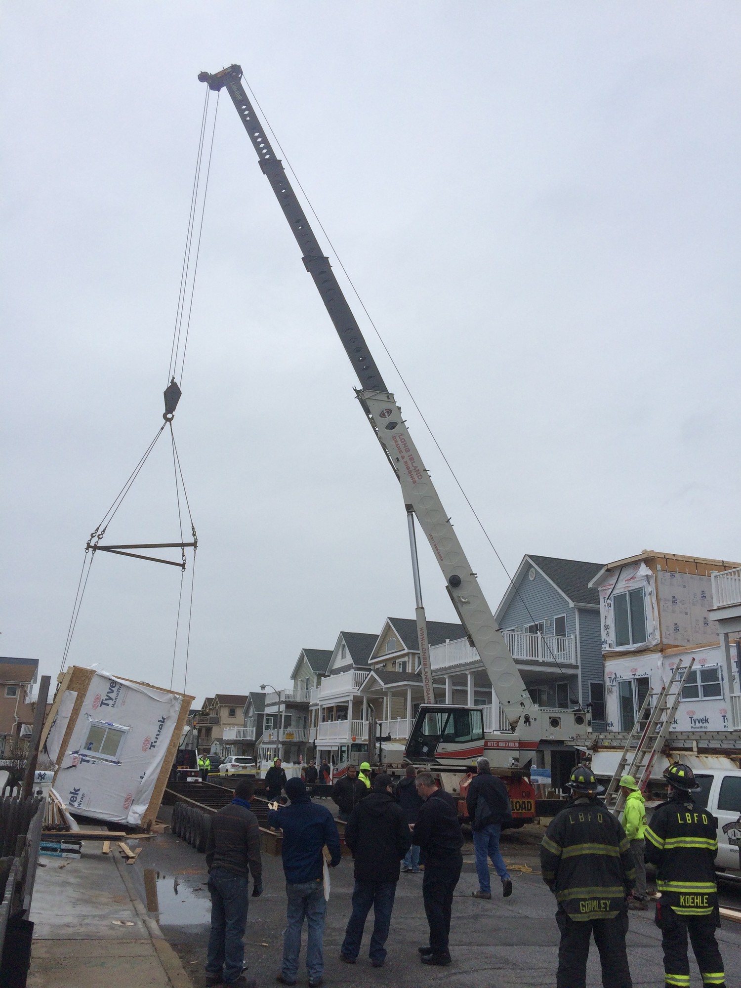 Officials said the unit had shifted as it was elevated by the crane.