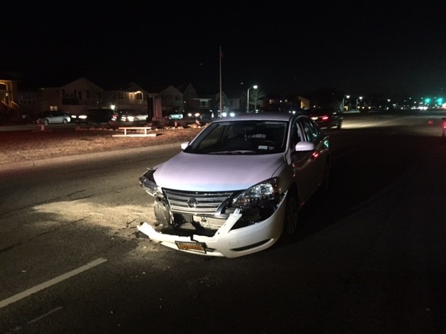 The driver of this Nissan Altima had a seizure behind the wheel and drifted into oncoming traffic.