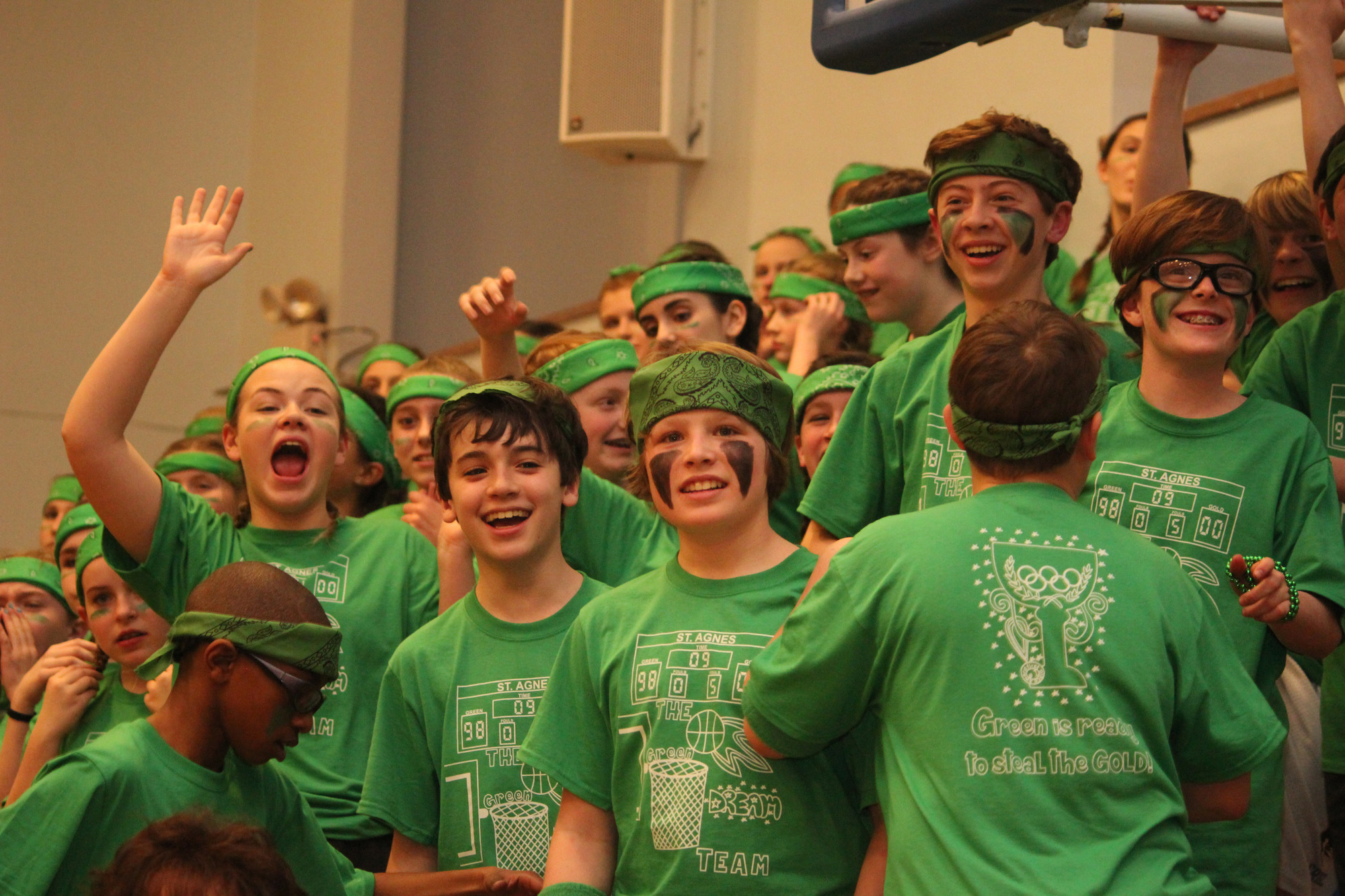 Green Team members watched and cheered from the stands while their teammates competed in events.