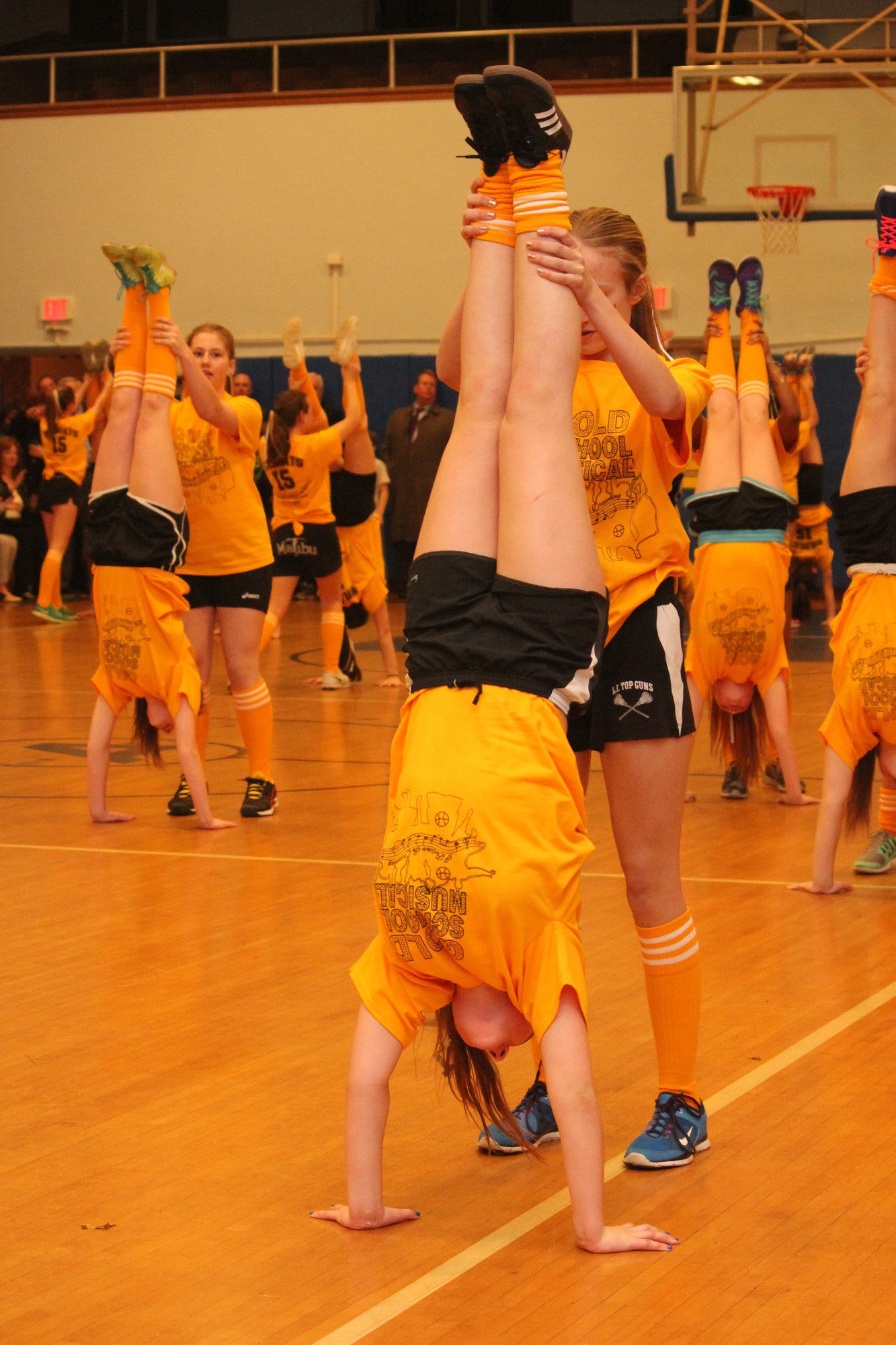 The Gold Team performed the acrobatic moves that the students coordinated.