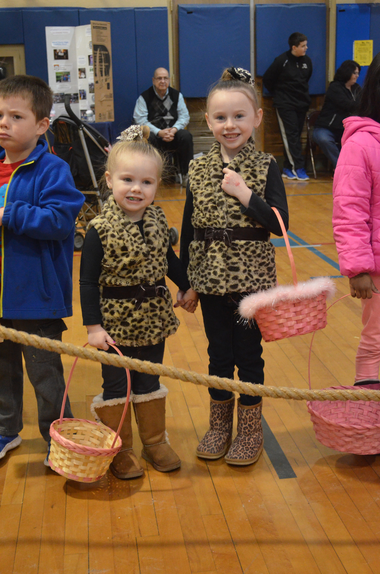 Sisters Emma and Ava Corcoran, 3 and 6, came to the egg hunt in style.