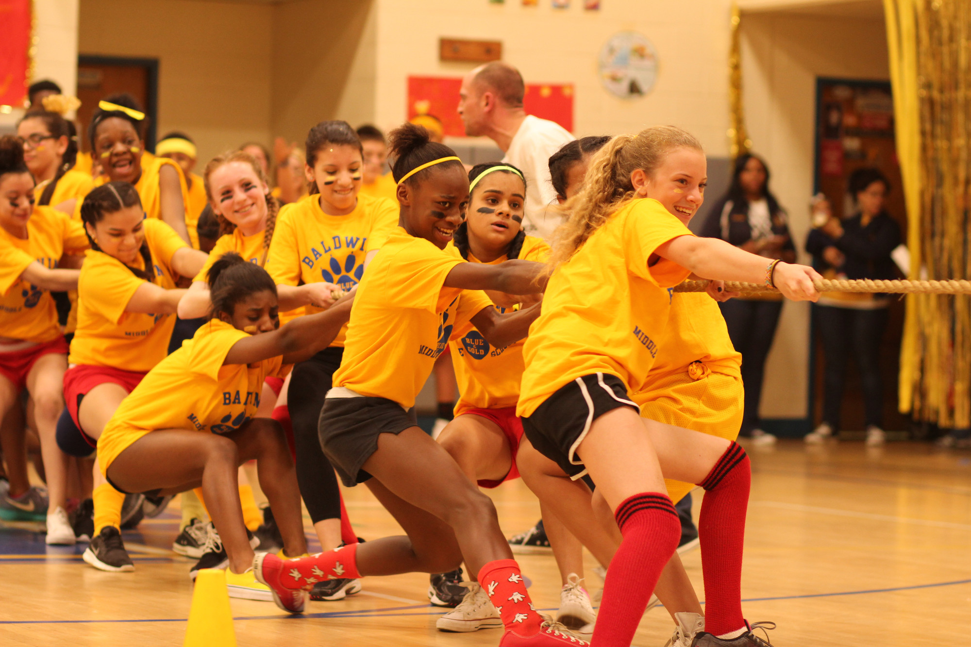The Gold Team gave it their all in the tug-of-war competition. About 150 eighth graders participated in the annual event.