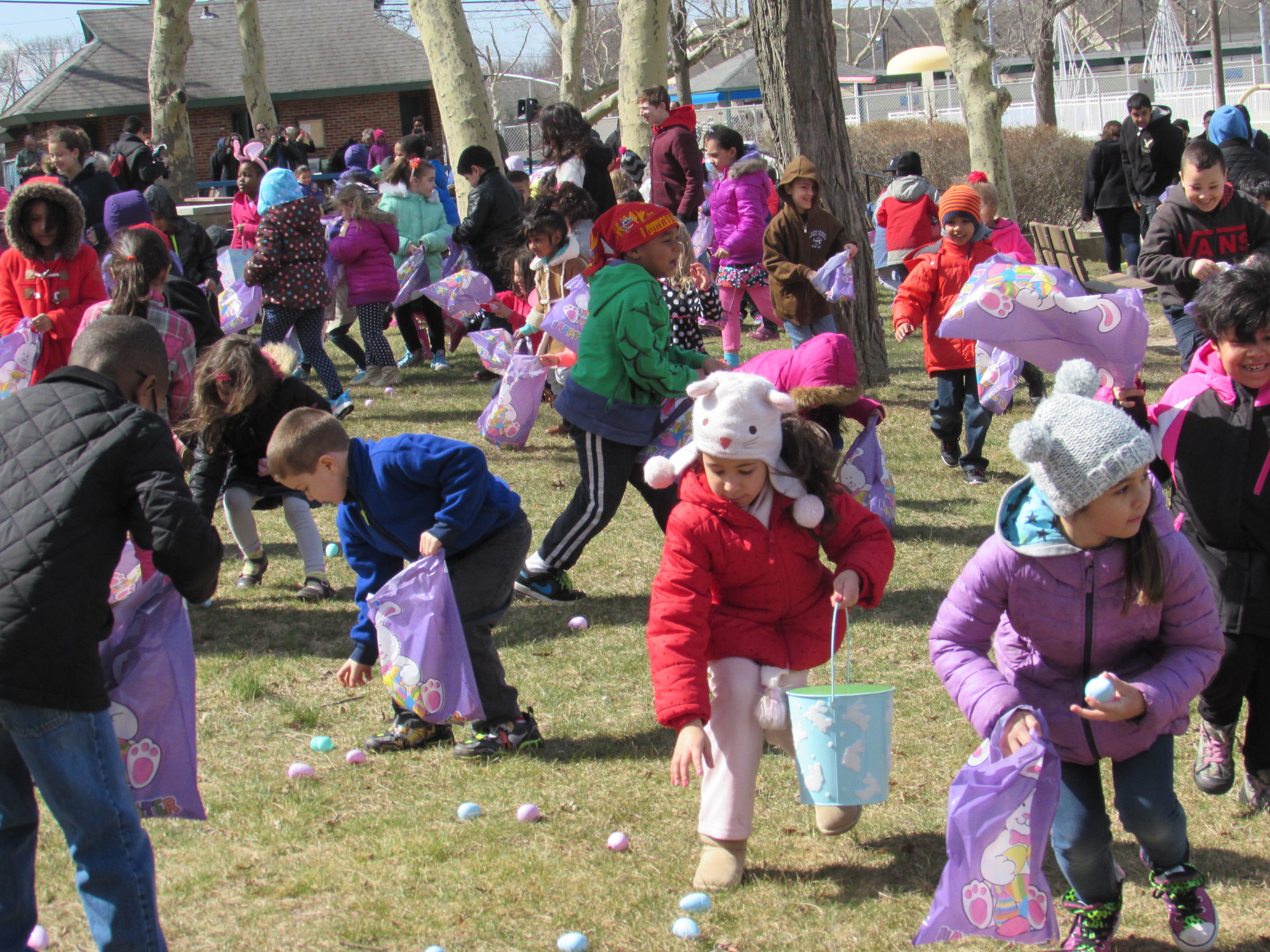 Children made a run for the eggs that were strewn around the grass.