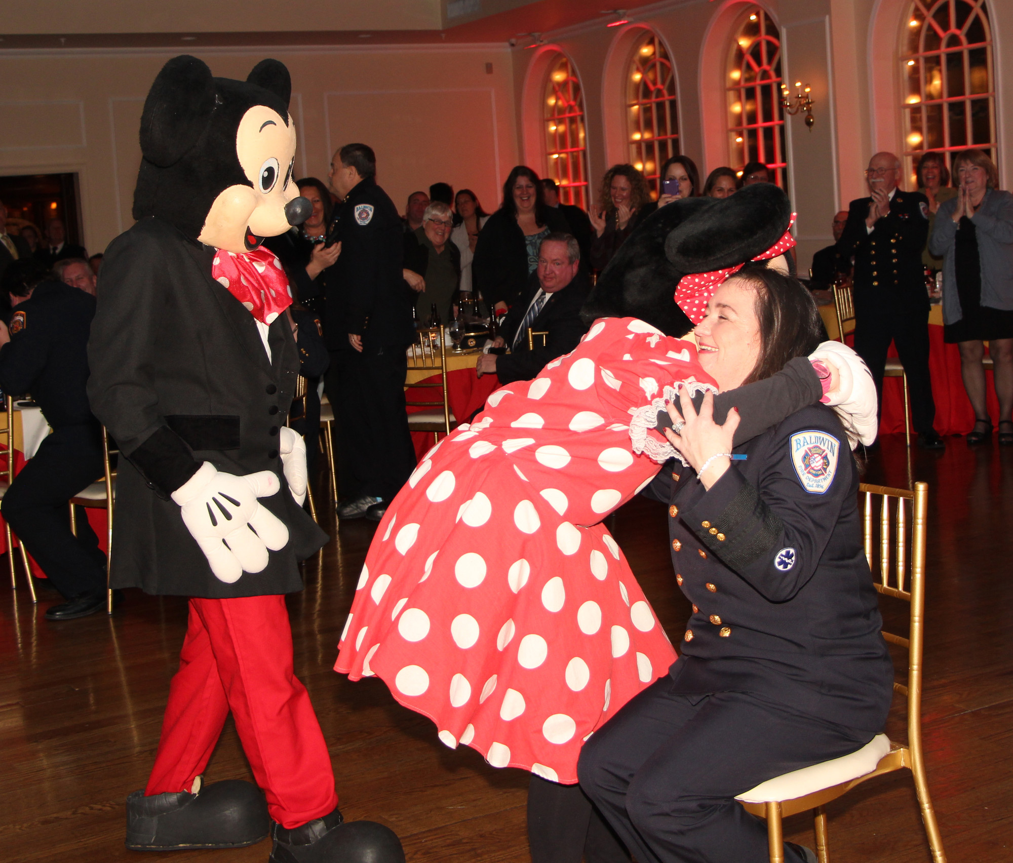 New chief Karen Bendel got a surprise visit Mickey and Minnie Mouse.