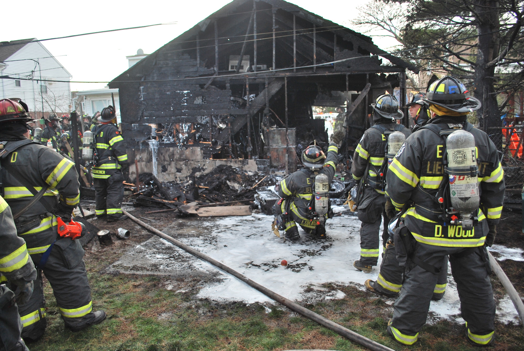 East Meadow Fire Department volunteers extinguished a fire that decimated a garage and shed in a Bright Avenue backyard on Wednesday, shortly before 5 p.m.