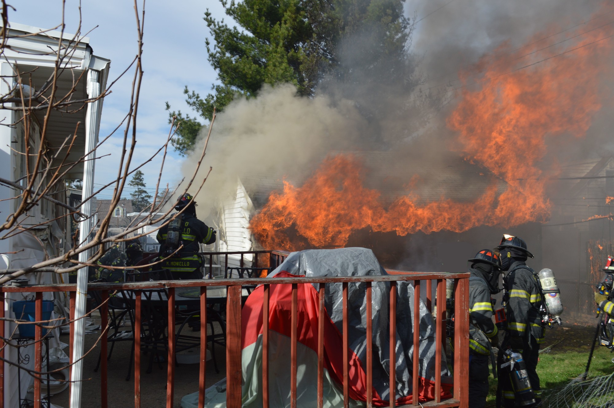 East Meadow Fire Department volunteers extinguished a fire that decimated a garage and shed in a Bright Avenue backyard on Wednesday, shortly before 5 p.m.   Photo courtesy of John O Brien Sr.