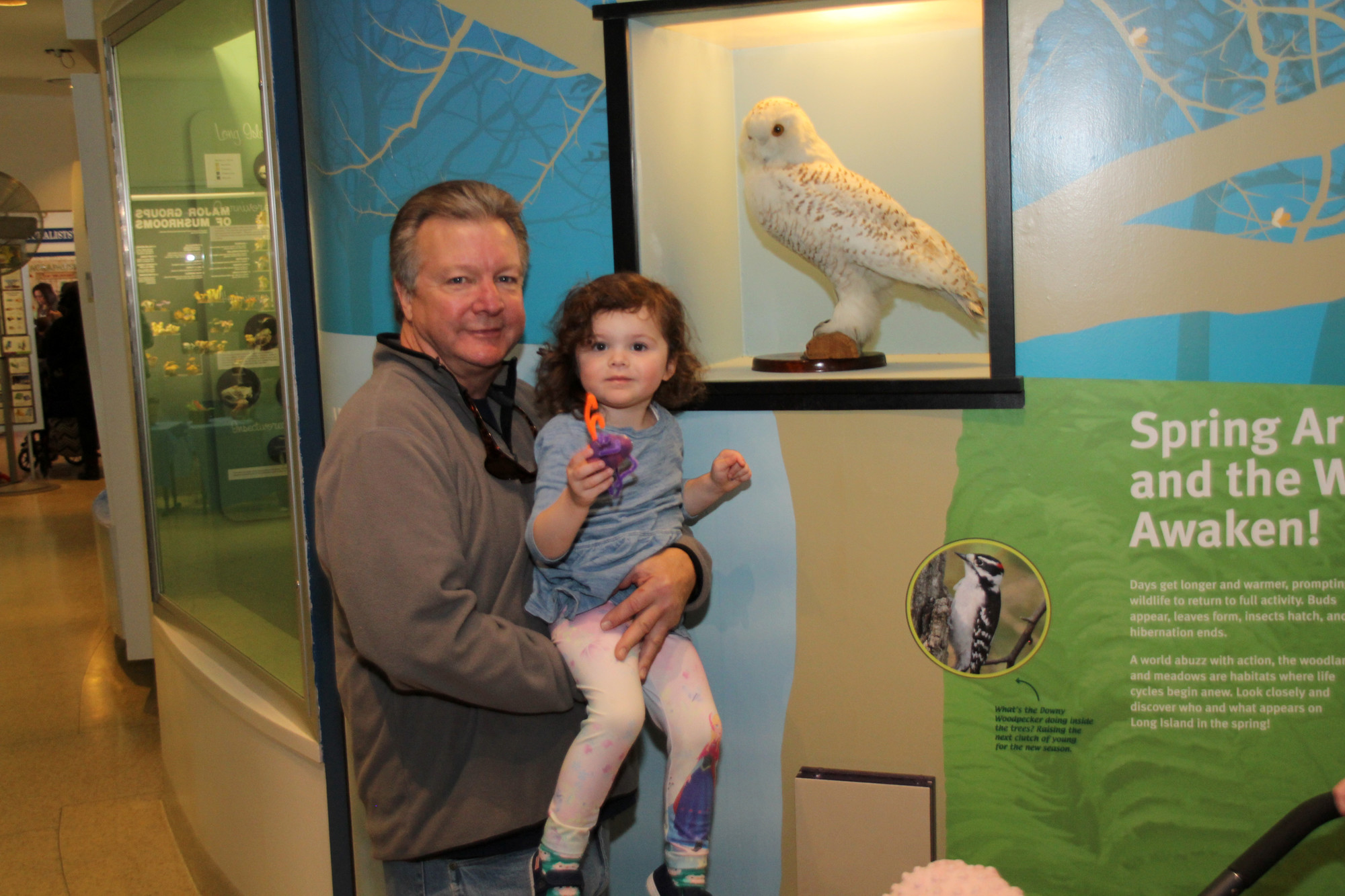 and his granddaughter, Hailey, 3, visited the various exhibits at the museum during the Earth Day celebration.