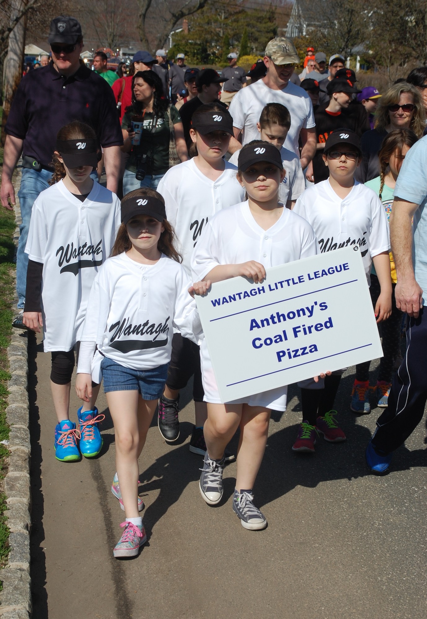 Teams marched through town for the Opening Day parade on April 18.