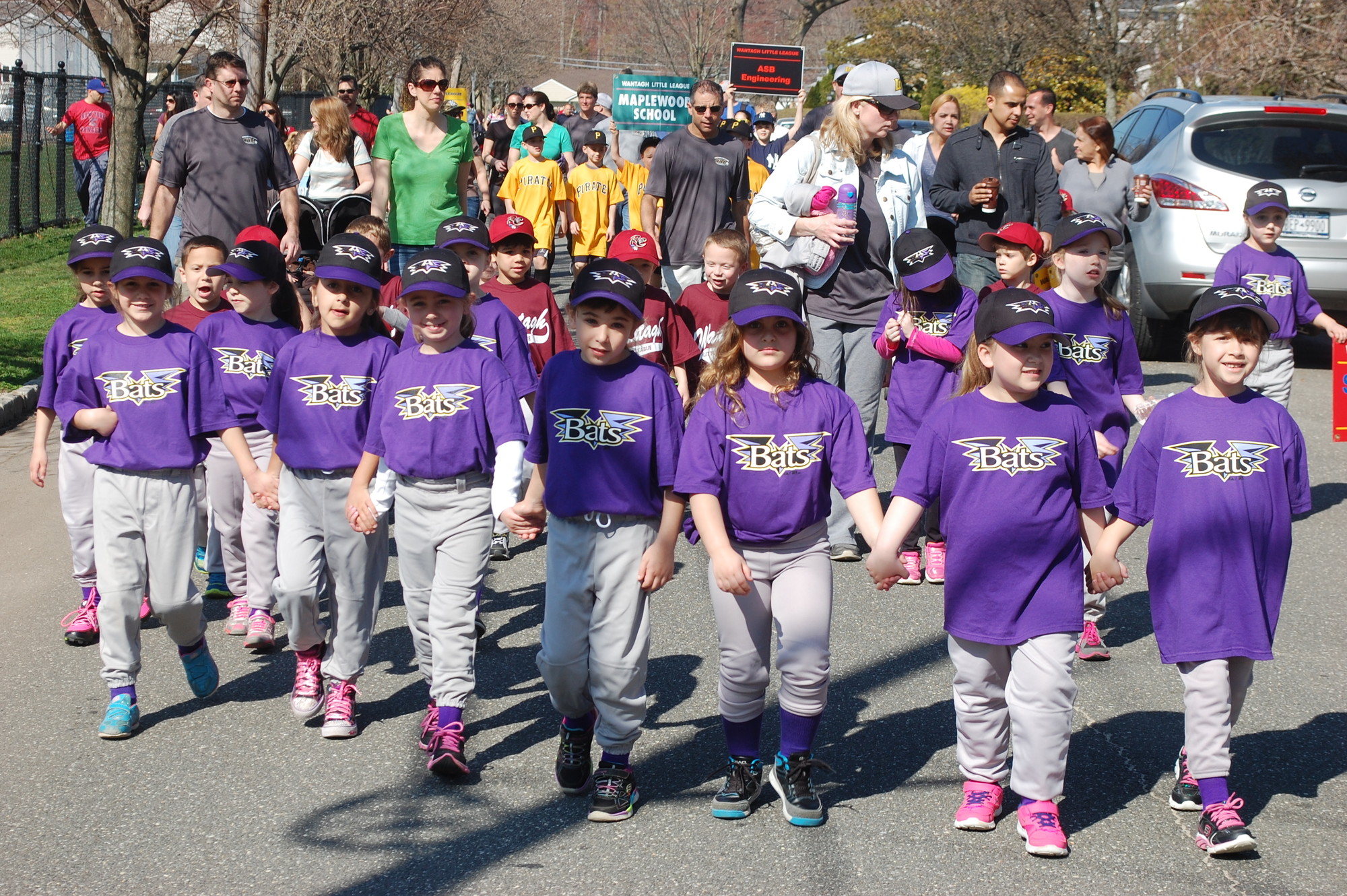 Members of the Bats marched down Demott Street on their way to Ciminelli Field for the Wantagh Little League’s Opening Day ceremony last Saturday morning.