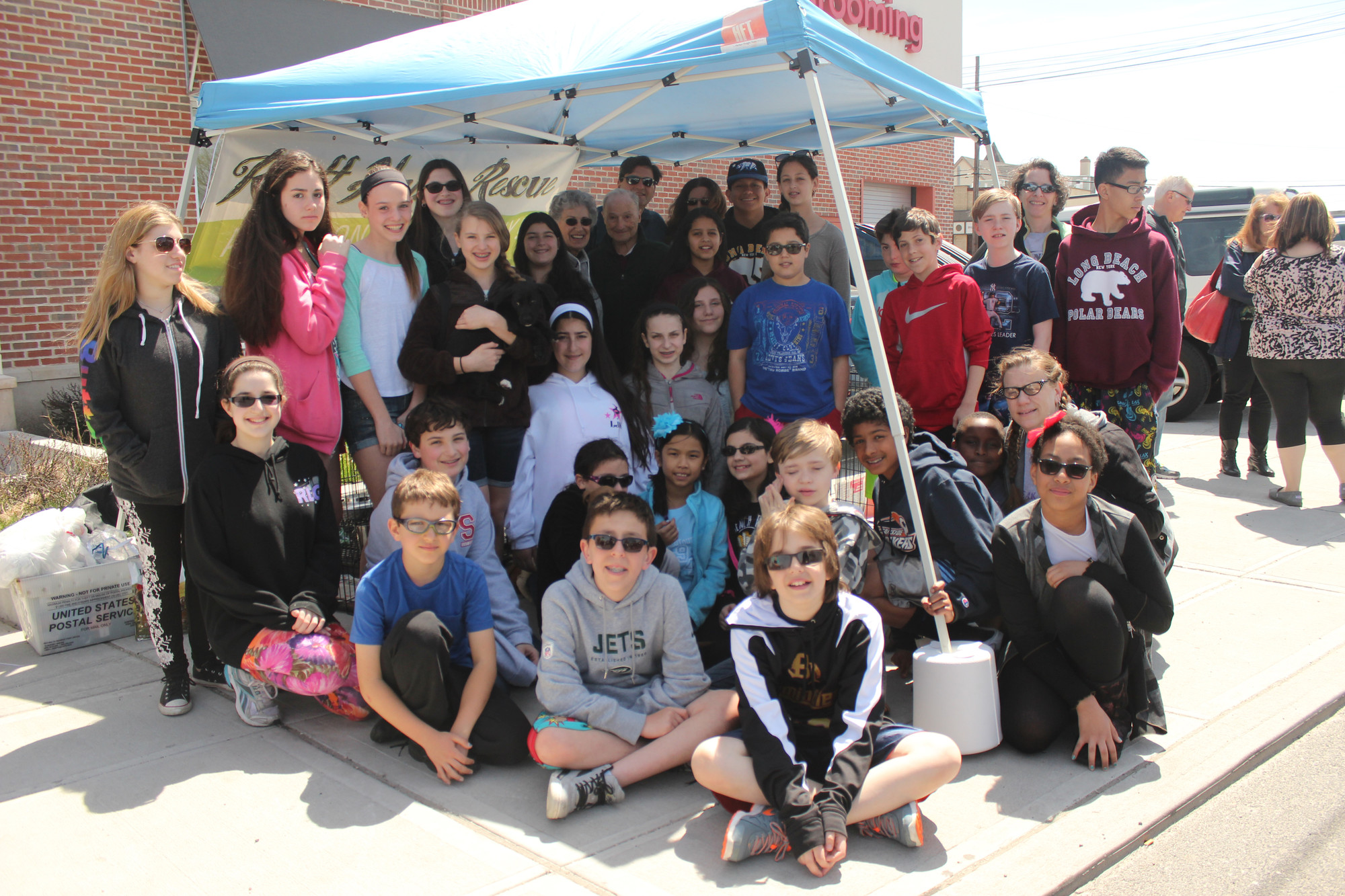 Temple Avodah members hosted Ruff House Rescue at the Petco in Oceanside. More than 30 members of all ages were on hand to see the dogs available for adoption.