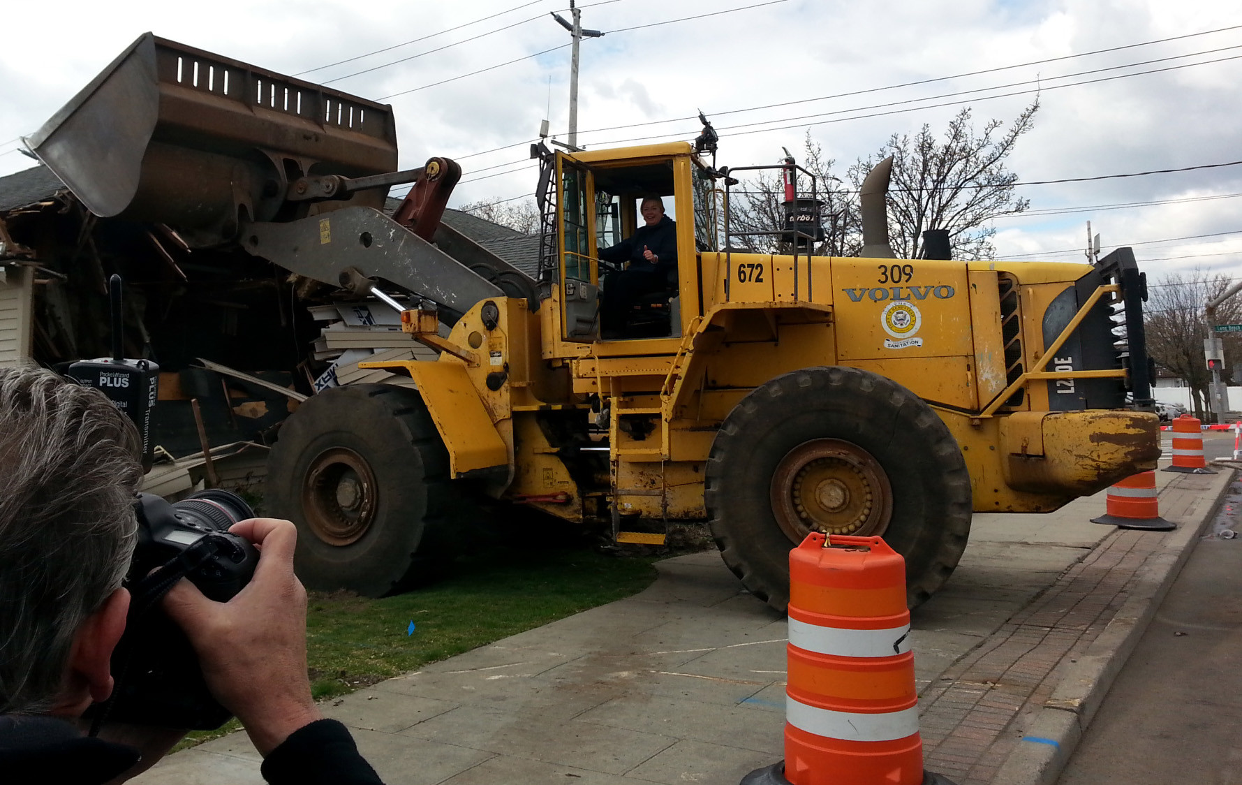Kate Murray drove the bulldozer that tore down Island Park Village Hall.