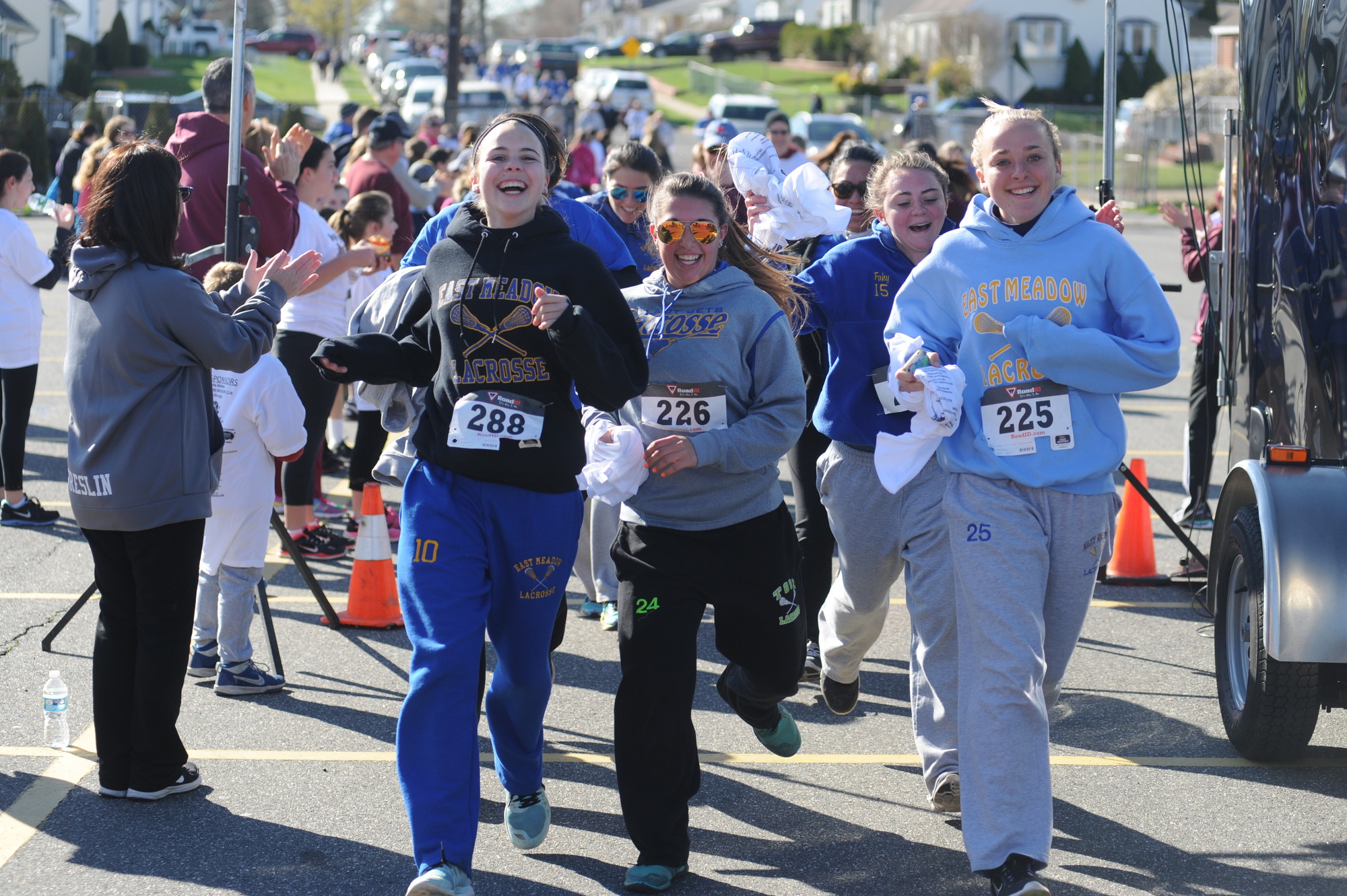 East Meadow High School’s girls’ lacrosse players crossed the finish line with a smile.