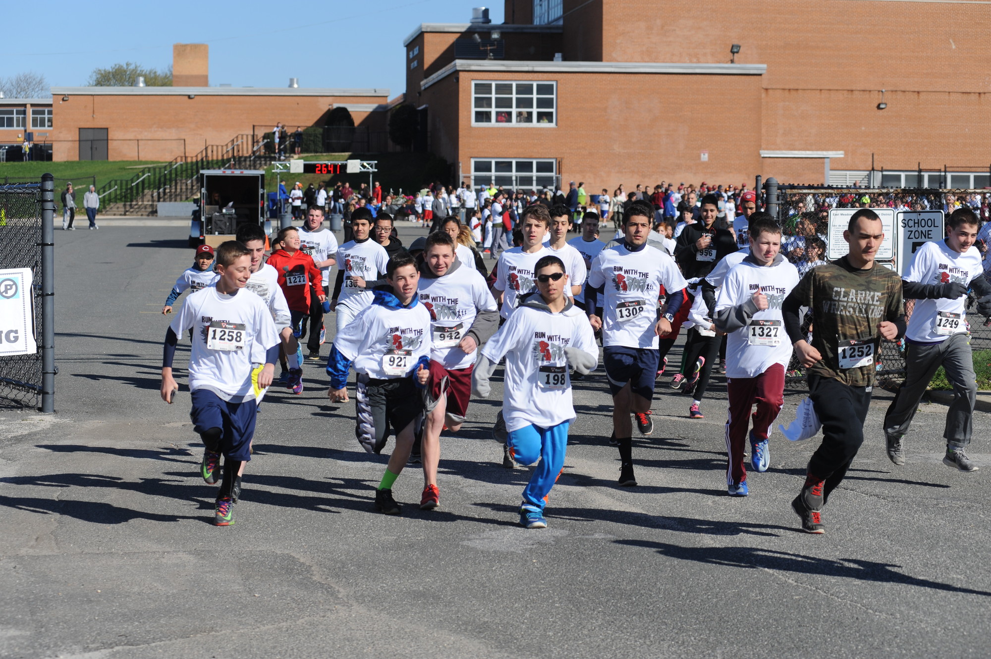 The seventh annual Run With the Rams 5K, which kicked off at W.T. Clarke High School at 9 a.m. last Saturday, drew hundreds of community members. The event’s proceeds are divided between the school’s athletic programs and local families that have fallen upon difficult times.