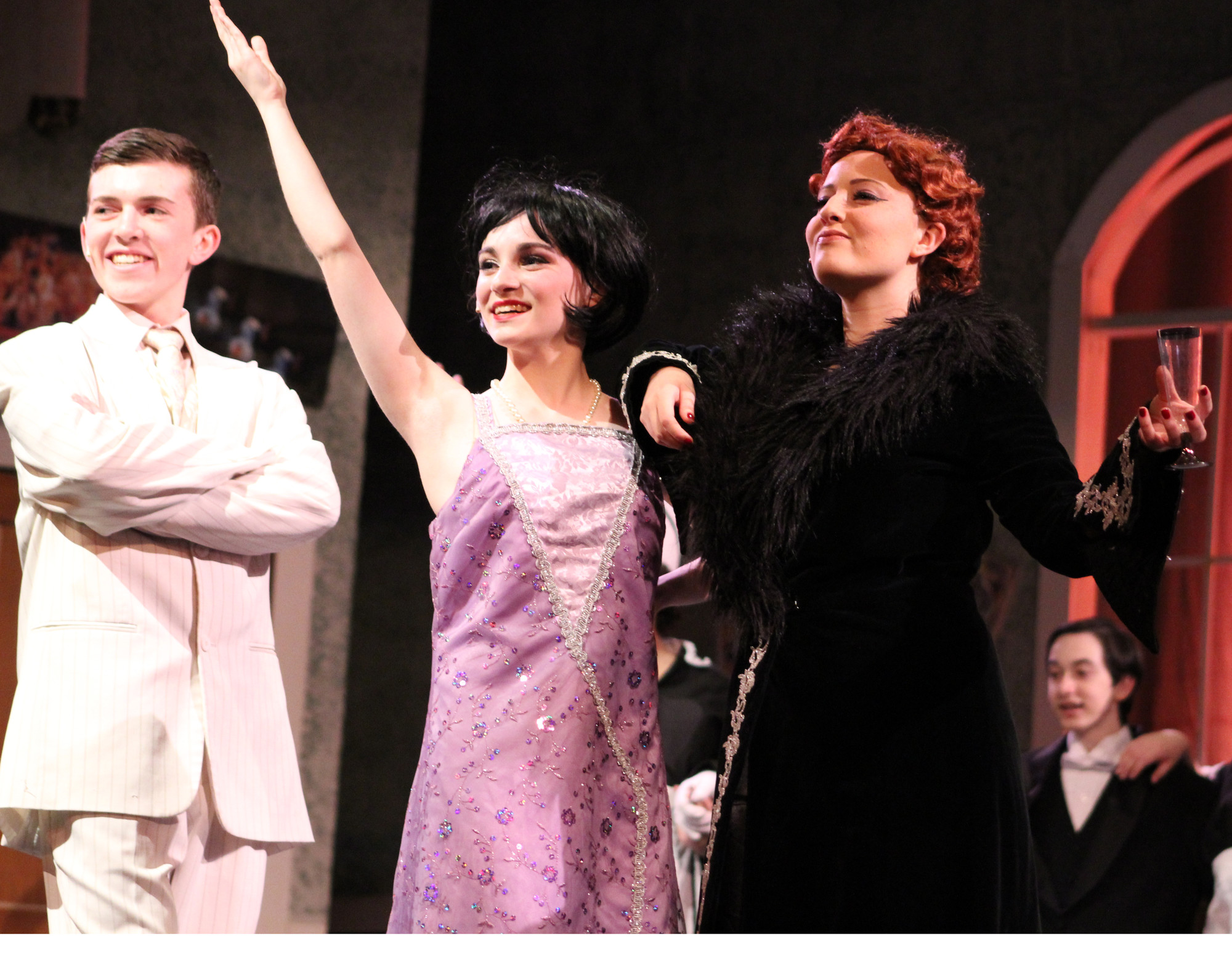 Jonathan DeTullio as Robert Martin, left, Olivia Dowden as Janet Van De Graaff and Courtney Krupa as the titular Drowsy Chaperone lit up the stage.