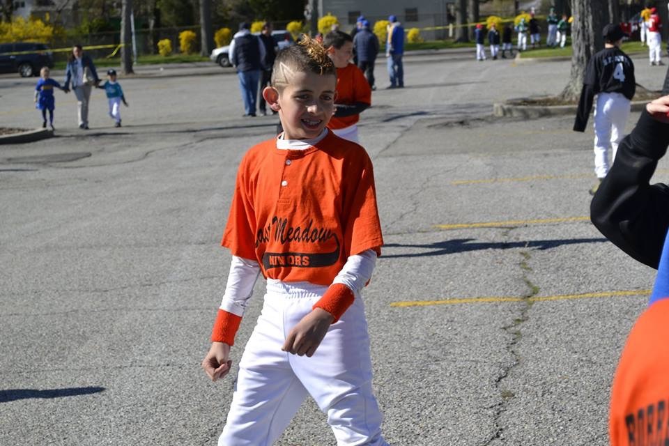 Peyton Kahl played tag with his friends before the parade.