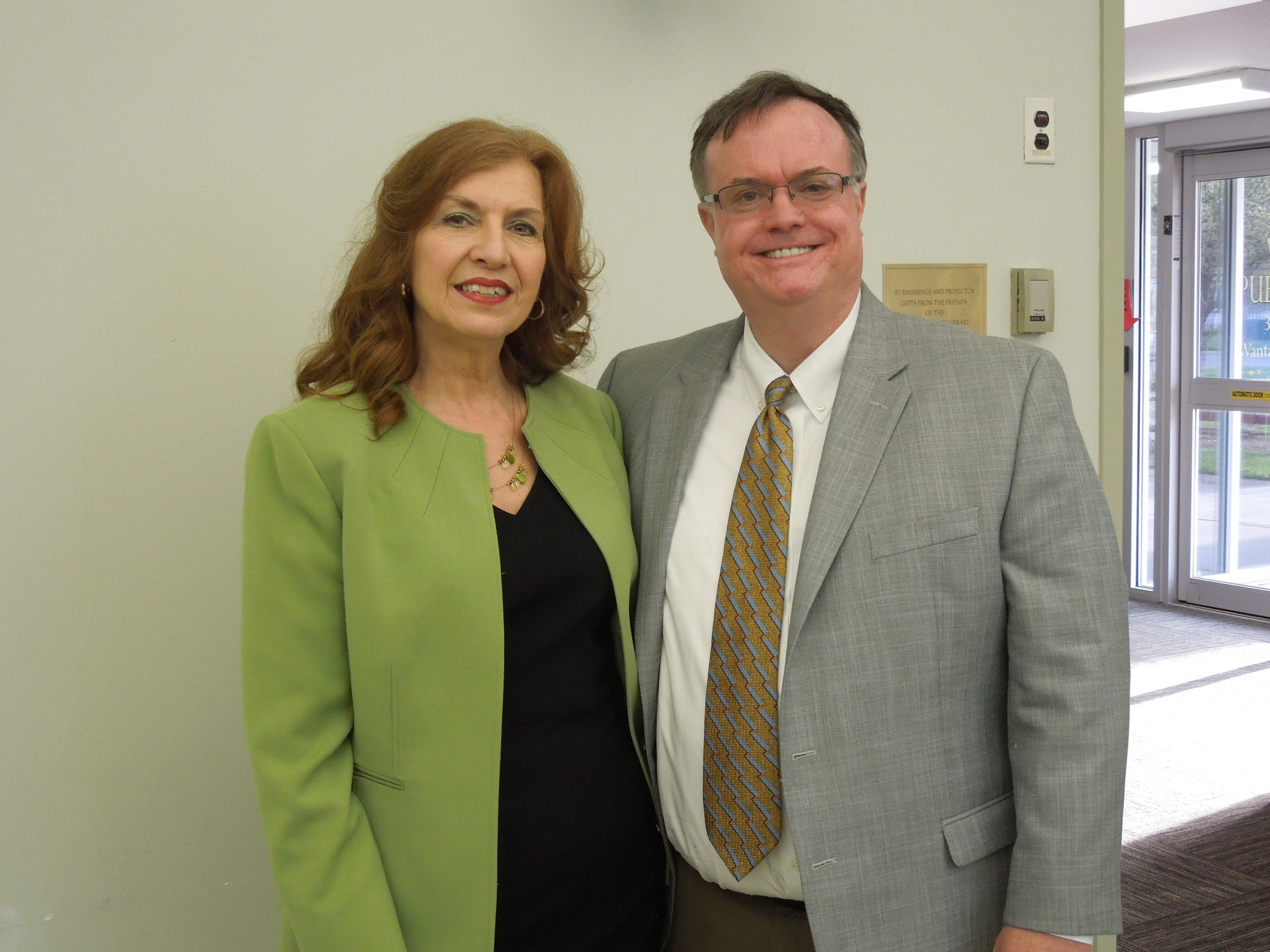 Nassau County Poet Laureate Lorraine LoFrese Conlin and Frank McKenna, a board director of the Nassau County Poet Laureate Society and Seaford Library director, at a poetry reading at the Wantagh Memorial Library.