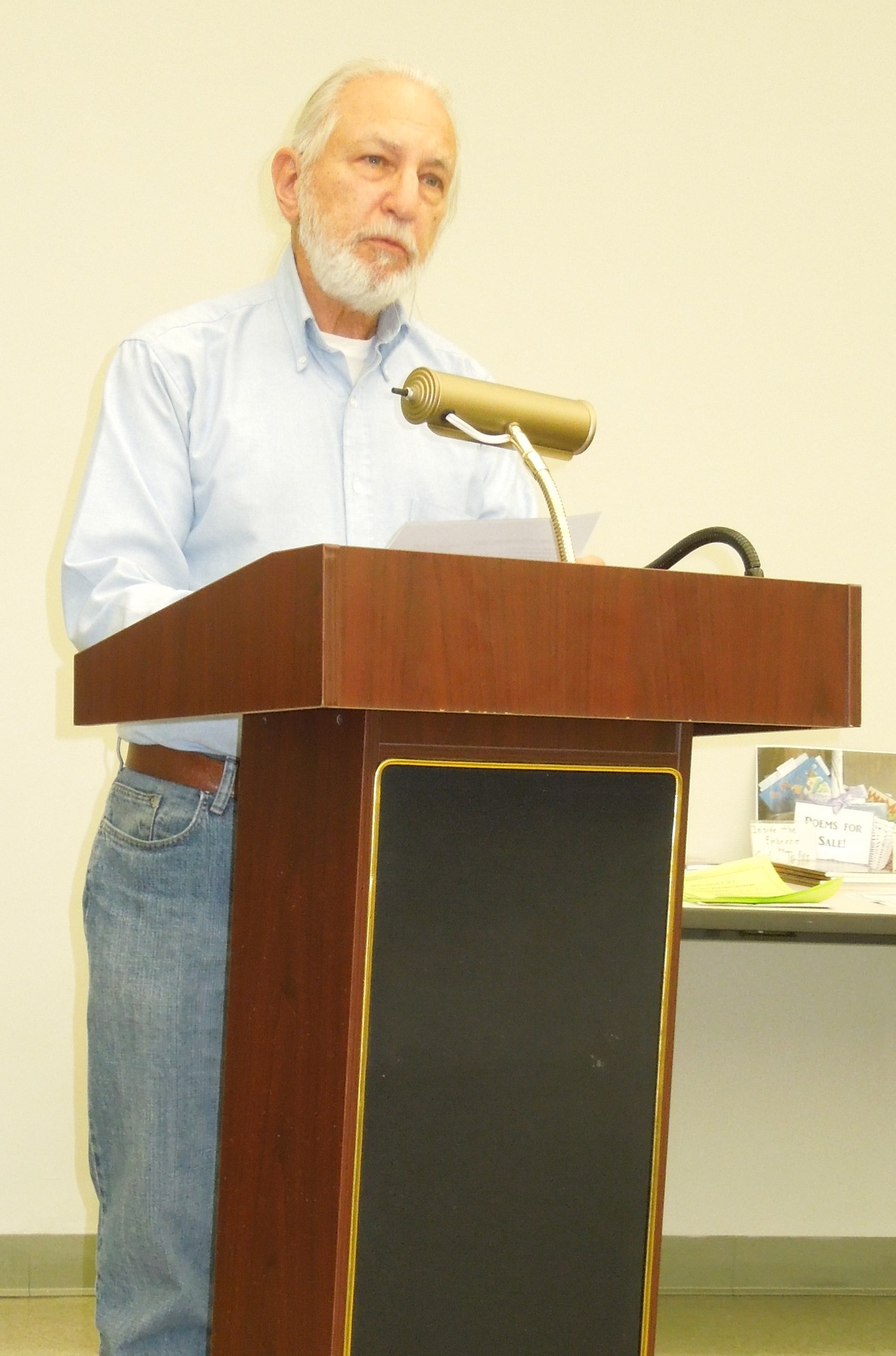 Arnold Hollander of Wantagh reads one of his poems during the open mic session at Wantagh Library on April 30.