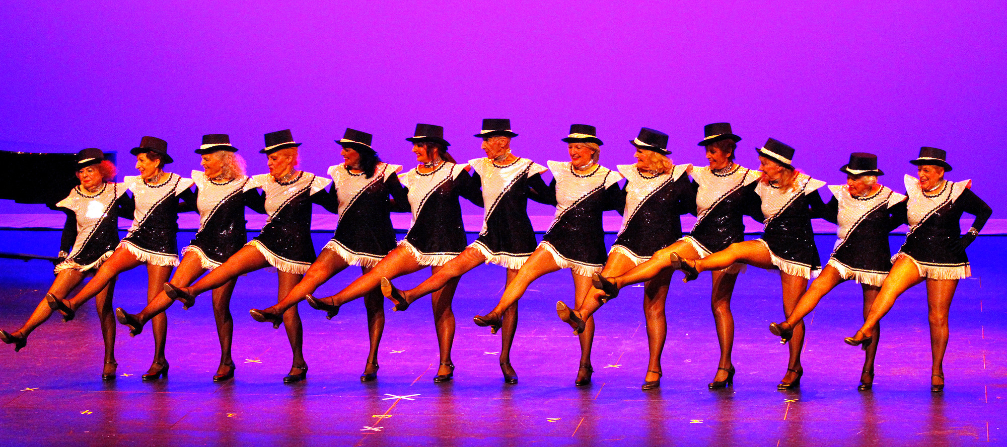 The Seasoned Steppers perform to New York, New York.