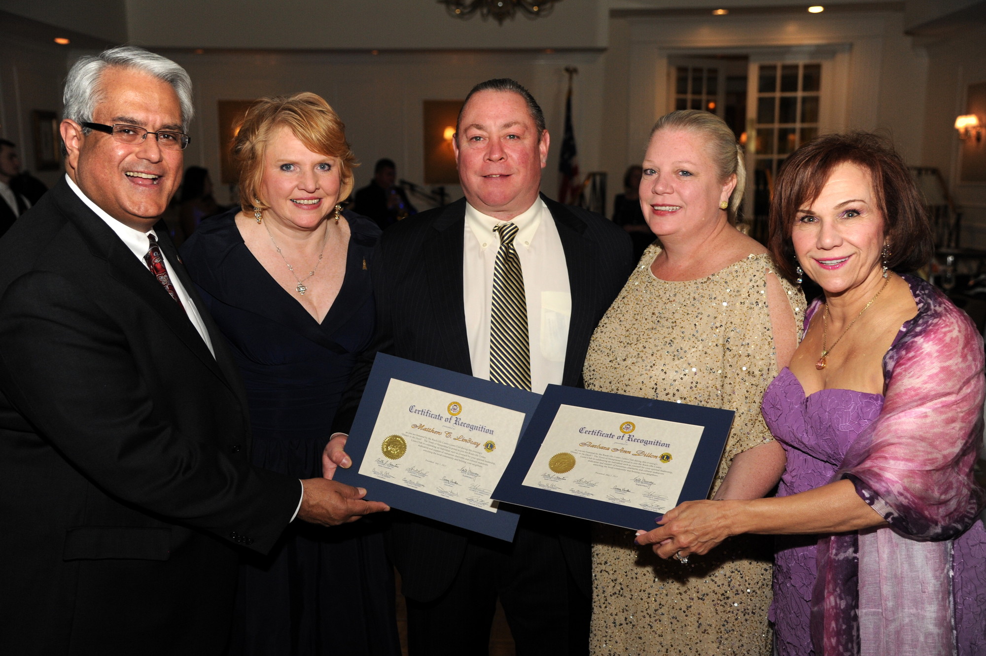 Town of Hempstead Councilman Anthony Santino, left, joined event co-organizers Lisa Spatz and Joan MacNaughton, right, in congratulating honorees Matthew Lindsay, center, and Barbara Ann Dillon.
