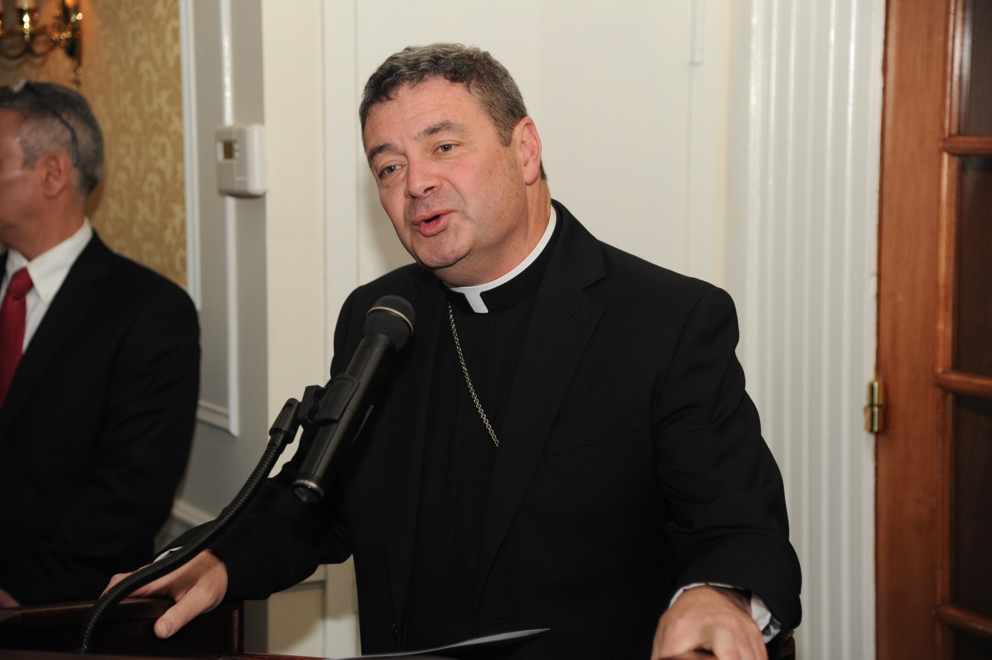 Auxiliary Bishop Robert Brennan addressed the audience.