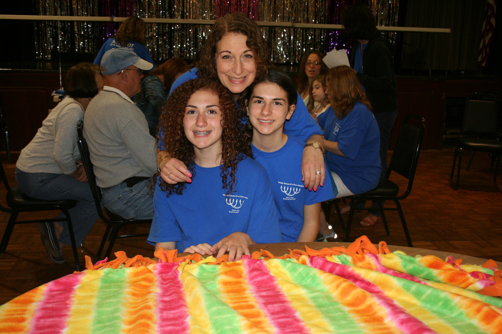 Cayla, 13, Janette, and Allie Goldstein,15, from left to right, were some of the approximately 100 volunteers who took part in Mitzvah Day.