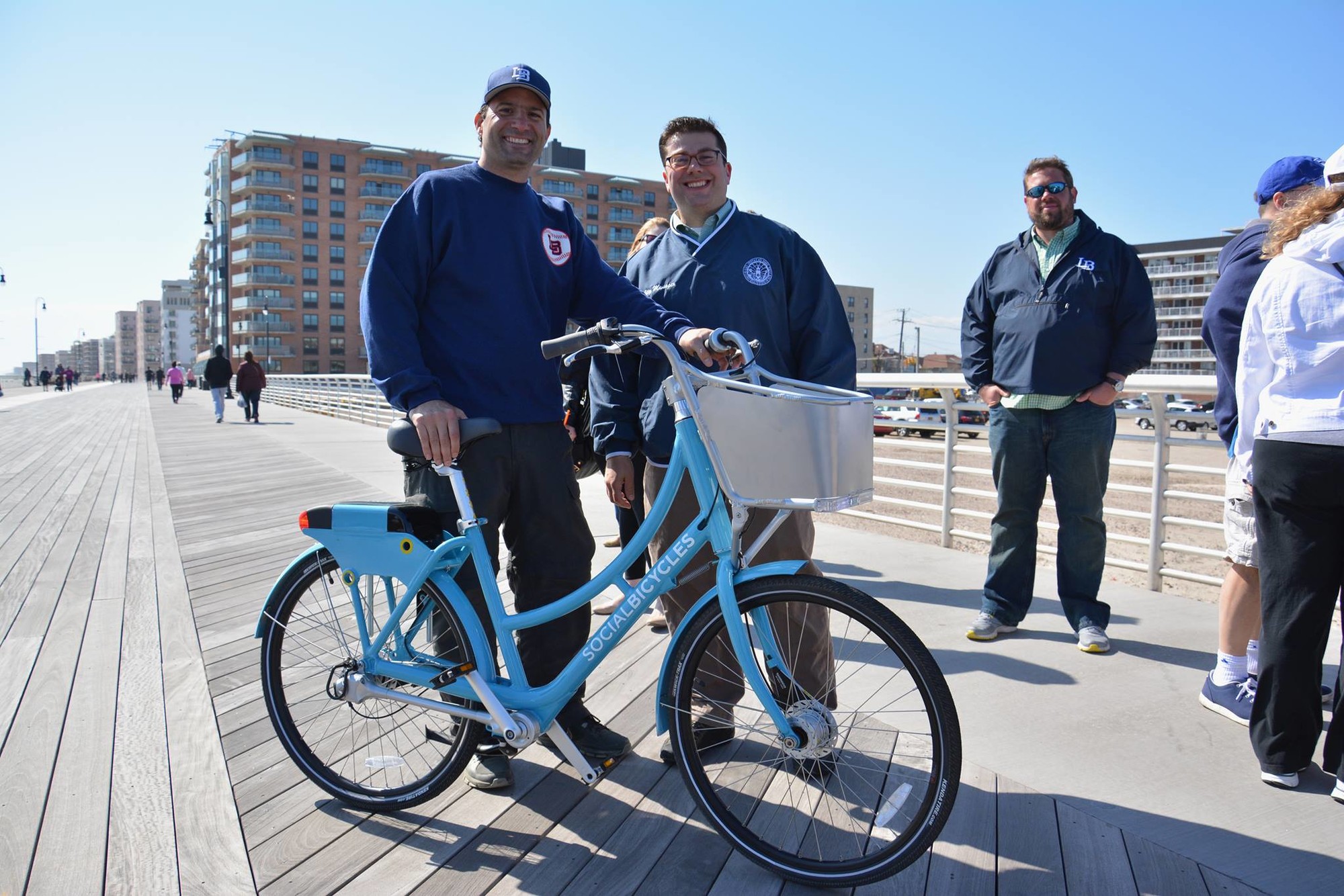 Councilman Anthony Eramo, left, and City Manager Jack Schnirman took one of the new Social Bicycles for a spin last Saturday, part of a new bike-sharing program in the city that launched this month.
